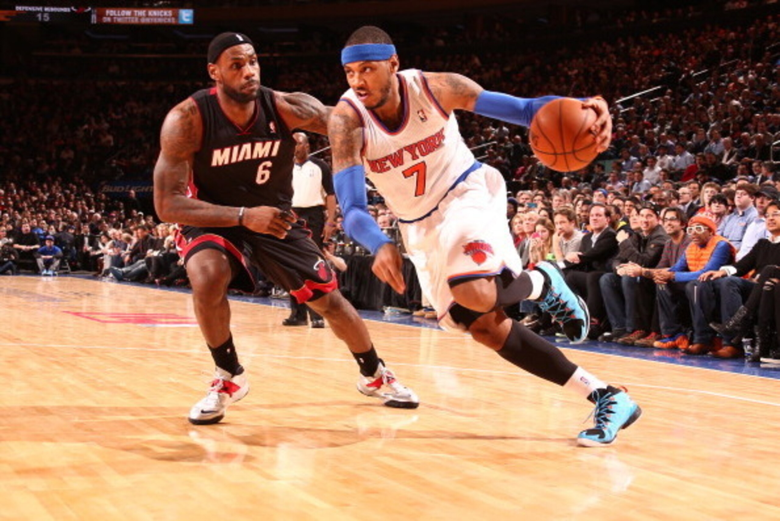 NEW YORK, NY - JANUARY 9: Carmelo Anthony #7 of the New York Knicks drives against LeBron James #6 of the Miami Heat during a game at Madison Square Garden in New York City on January 9, 2014.  NOTE TO USER: User expressly acknowledges and agrees that, by