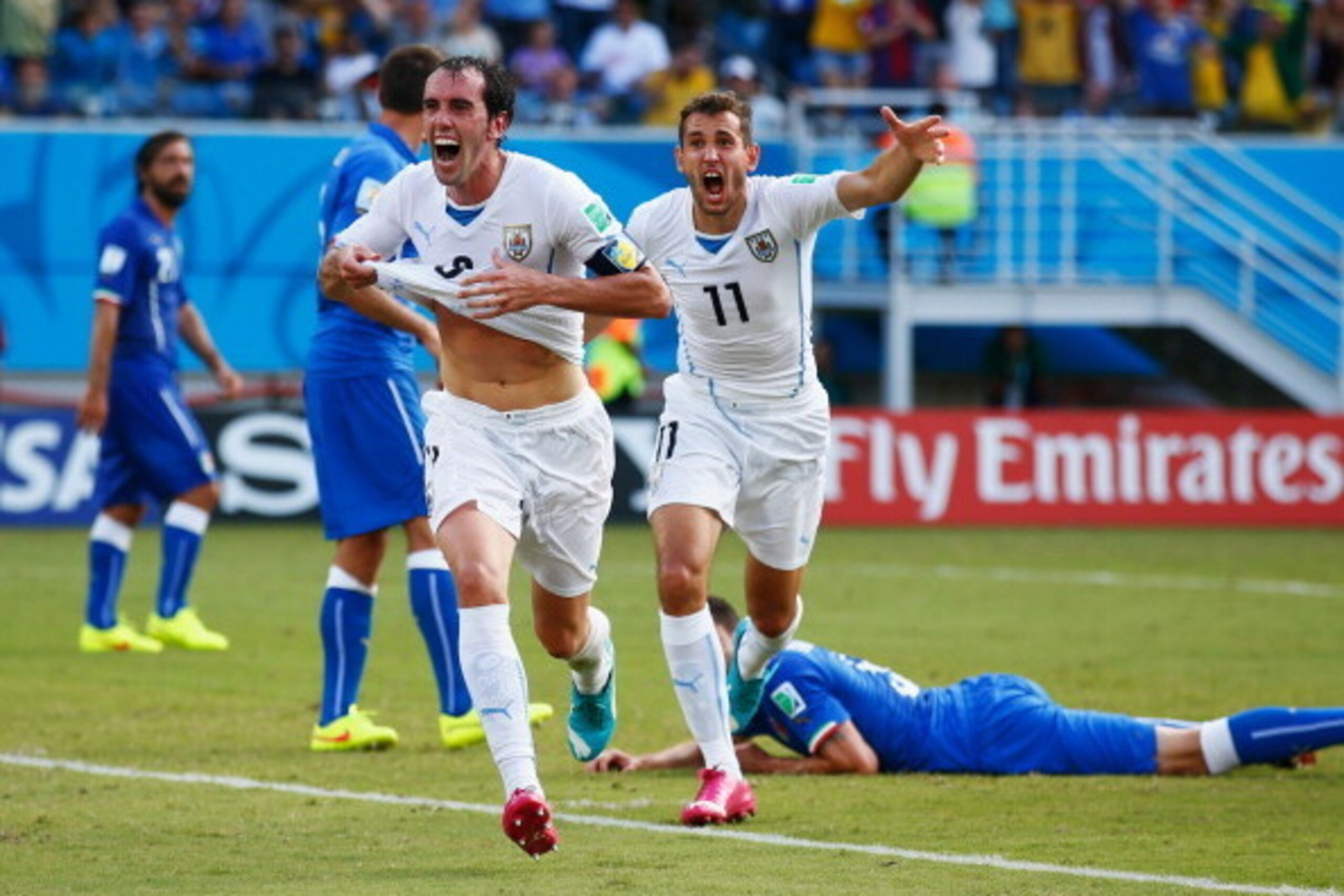 NATAL, BRAZIL - JUNE 24:  Diego Godin of Uruguay celebrates scoring his team's first goal during the 2014 FIFA World Cup Brazil Group D match between Italy and Uruguay at Estadio das Dunas on June 24, 2014 in Natal, Brazil.  (Photo by Clive Rose/Getty Ima