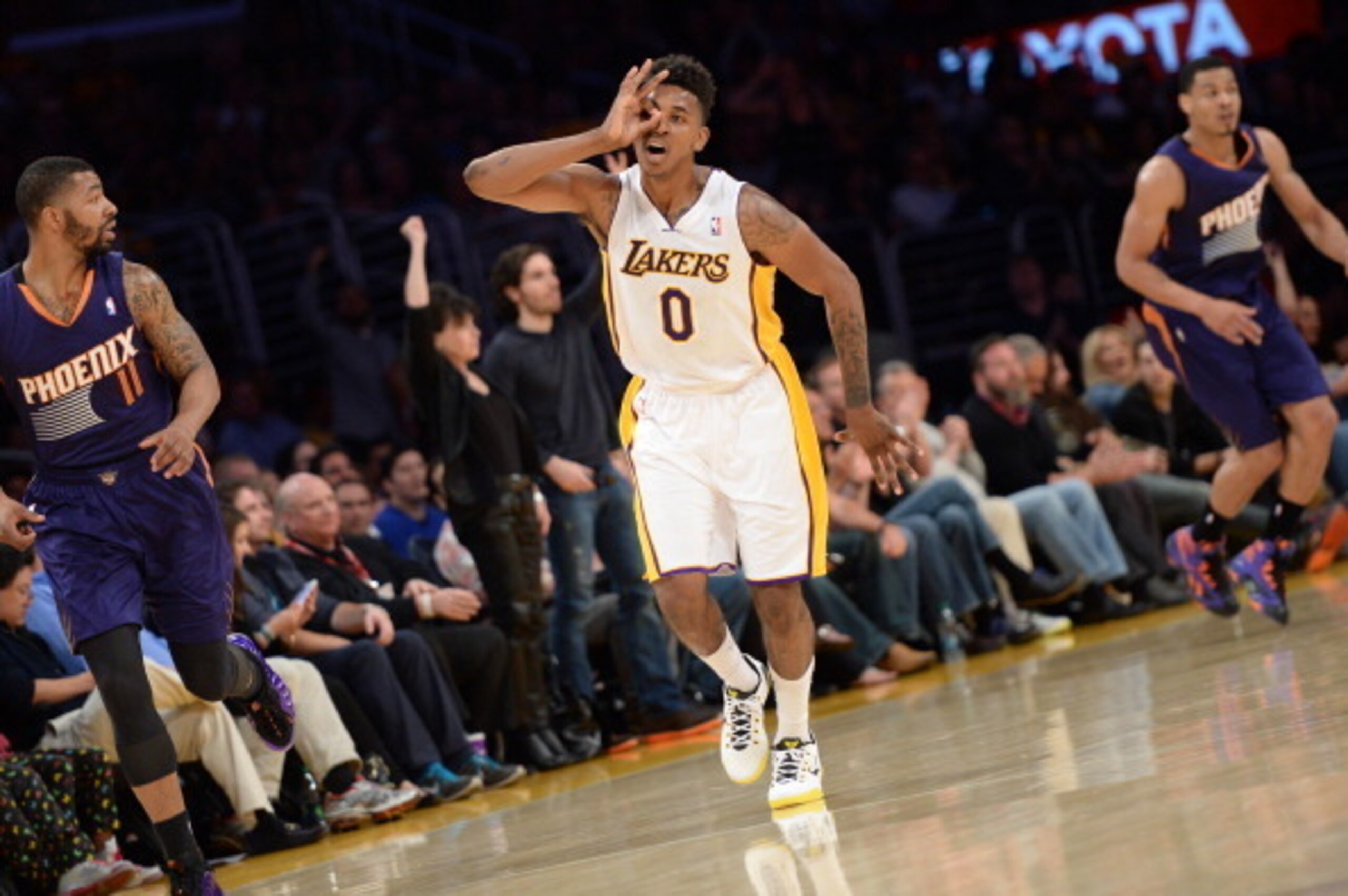 LOS ANGELES, CA - MARCH 30: Nick Young #0 of the Los Angeles Lakers gestures during a game against the Phoenix Suns at STAPLES Center on March 30, 2014 in Los Angeles, California. NOTE TO USER: User expressly acknowledges and agrees that, by downloading a