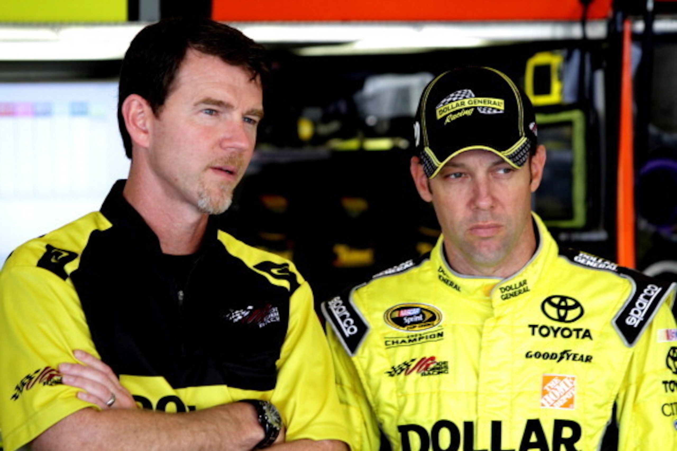 SONOMA, CA - JUNE 20:  Matt Kenseth, driver of the #20 Dollar General Toyota, stands in the garage area during practice for the NASCAR Sprint Cup Series Toyota/Save Mart 350 at Sonoma Raceway on June 20, 2014 in Sonoma, California.  (Photo by Jerry Markla