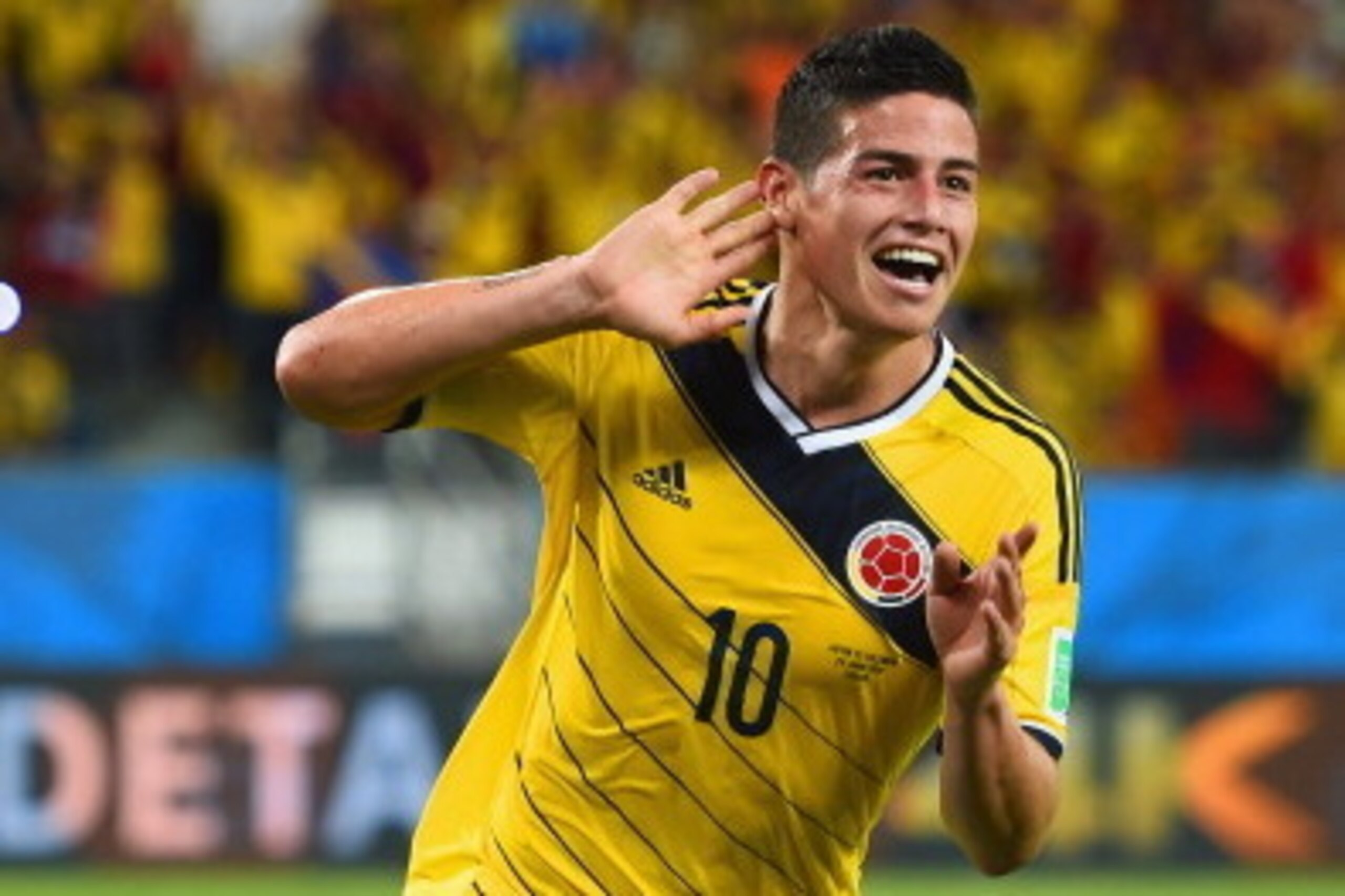 CUIABA, BRAZIL - JUNE 24:  James Rodriguez of Colombia celebrates scoring his team's fourth goal during the 2014 FIFA World Cup Brazil Group C match between Japan and Colombia at Arena Pantanal on June 24, 2014 in Cuiaba, Brazil.  (Photo by Christopher Le