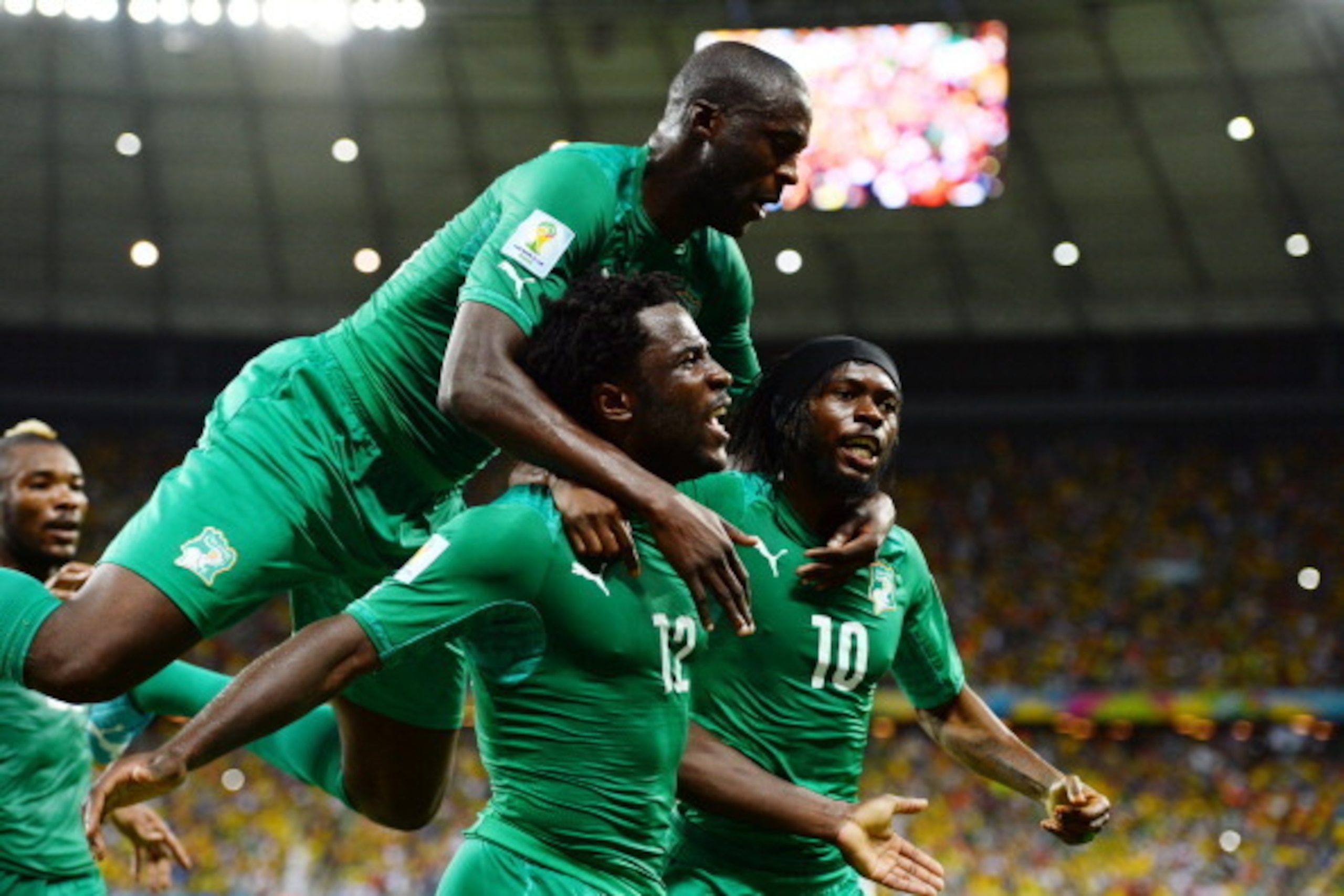 FORTALEZA, BRAZIL - JUNE 24:  Wilfried Bony of the Ivory Coast (C) celebrates scoring his team's first goal with Yaya Toure (L) and Gervinho during the 2014 FIFA World Cup Brazil Group C match between Greece and the Ivory Coast at Castelao on June 24, 201