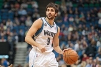 Apr 16, 2014; Minneapolis, MN, USA; Minnesota Timberwolves guard Ricky Rubio (9) dribbles against the Utah Jazz at Target Center. Mandatory Credit: Brad Rempel-USA TODAY Sports