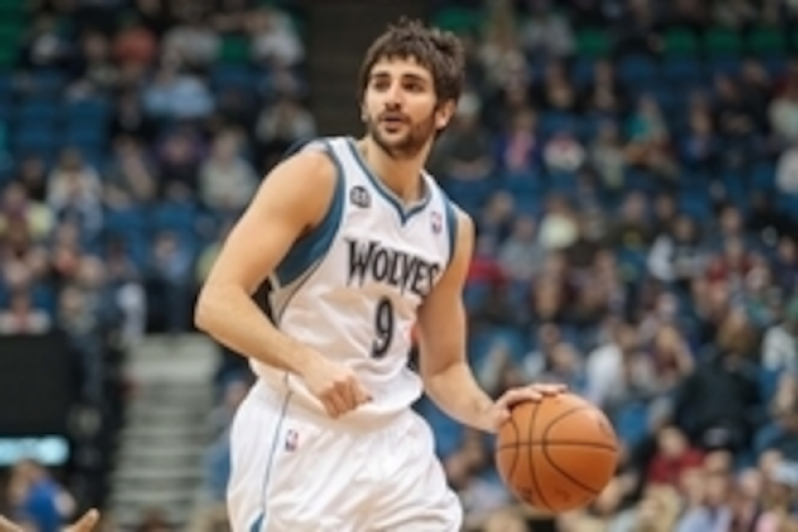 Apr 16, 2014; Minneapolis, MN, USA; Minnesota Timberwolves guard Ricky Rubio (9) dribbles against the Utah Jazz at Target Center. Mandatory Credit: Brad Rempel-USA TODAY Sports