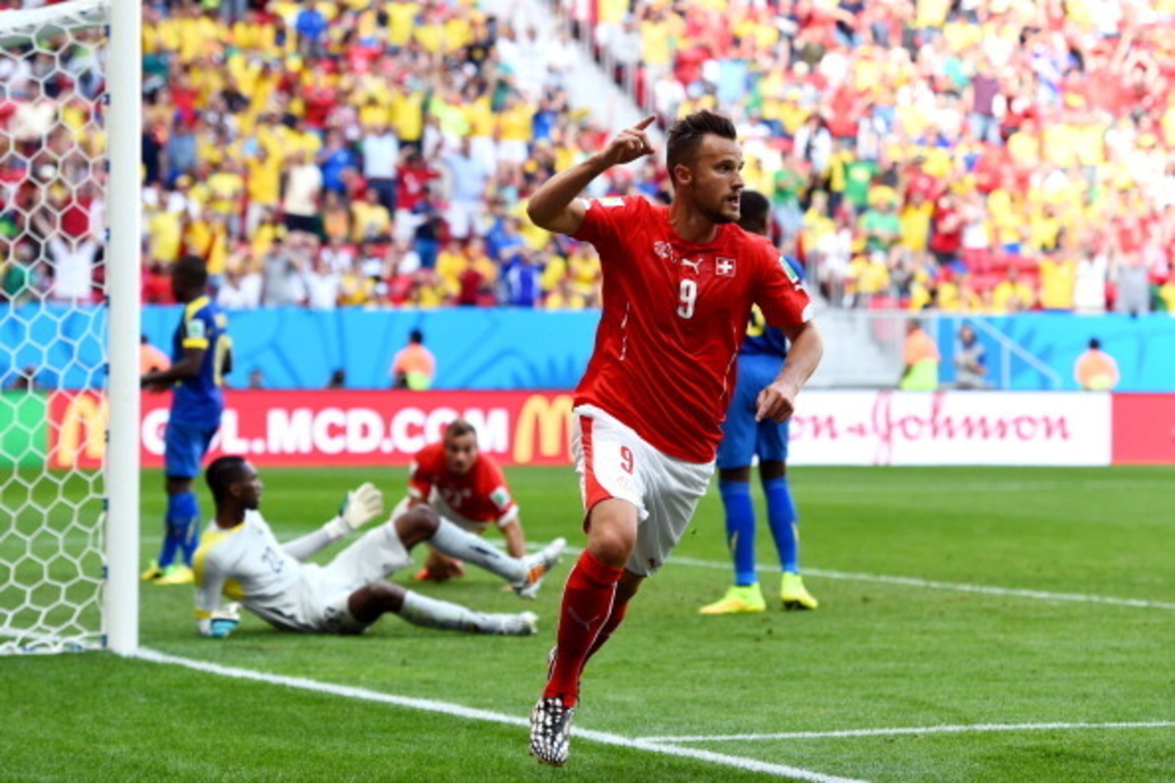 BRASILIA, BRAZIL - JUNE 15: Haris Seferovic of Switzerland celebrates scoring his team's second goal during the 2014 FIFA World Cup Brazil Group E match between Switzerland and Ecuador at Estadio Nacional on June 15, 2014 in Brasilia, Brazil. (Photo by BRASILIA, BRAZIL - JUNE 15: Haris Seferovic of Switzerland celebrates scoring his team's second goal during the 2014 FIFA World Cup Brazil Group E match between Switzerland and Ecuador at Estadio Nacional on June 15, 2014 in Brasilia, Brazil. (Photo by