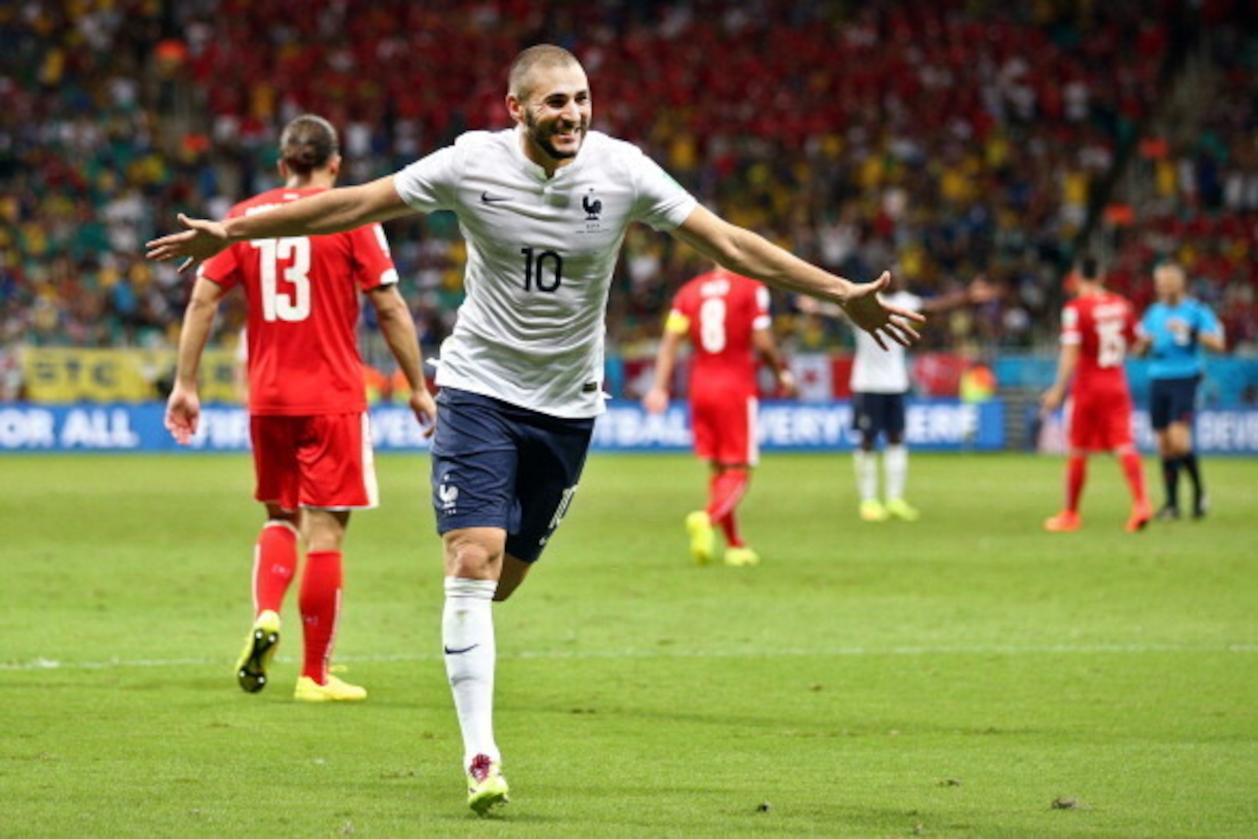 SALVADOR, BRAZIL - JUNE 20: Karim Benzema of France celebrates a goal that came after the referee had blown full time during the 2014 FIFA World Cup Brazil Group E match between Switzerland and France at Arena Fonte Nova on June 20, 2014 in Salvador, Bra SALVADOR, BRAZIL - JUNE 20: Karim Benzema of France celebrates a goal that came after the referee had blown full time during the 2014 FIFA World Cup Brazil Group E match between Switzerland and France at Arena Fonte Nova on June 20, 2014 in Salvador, Bra