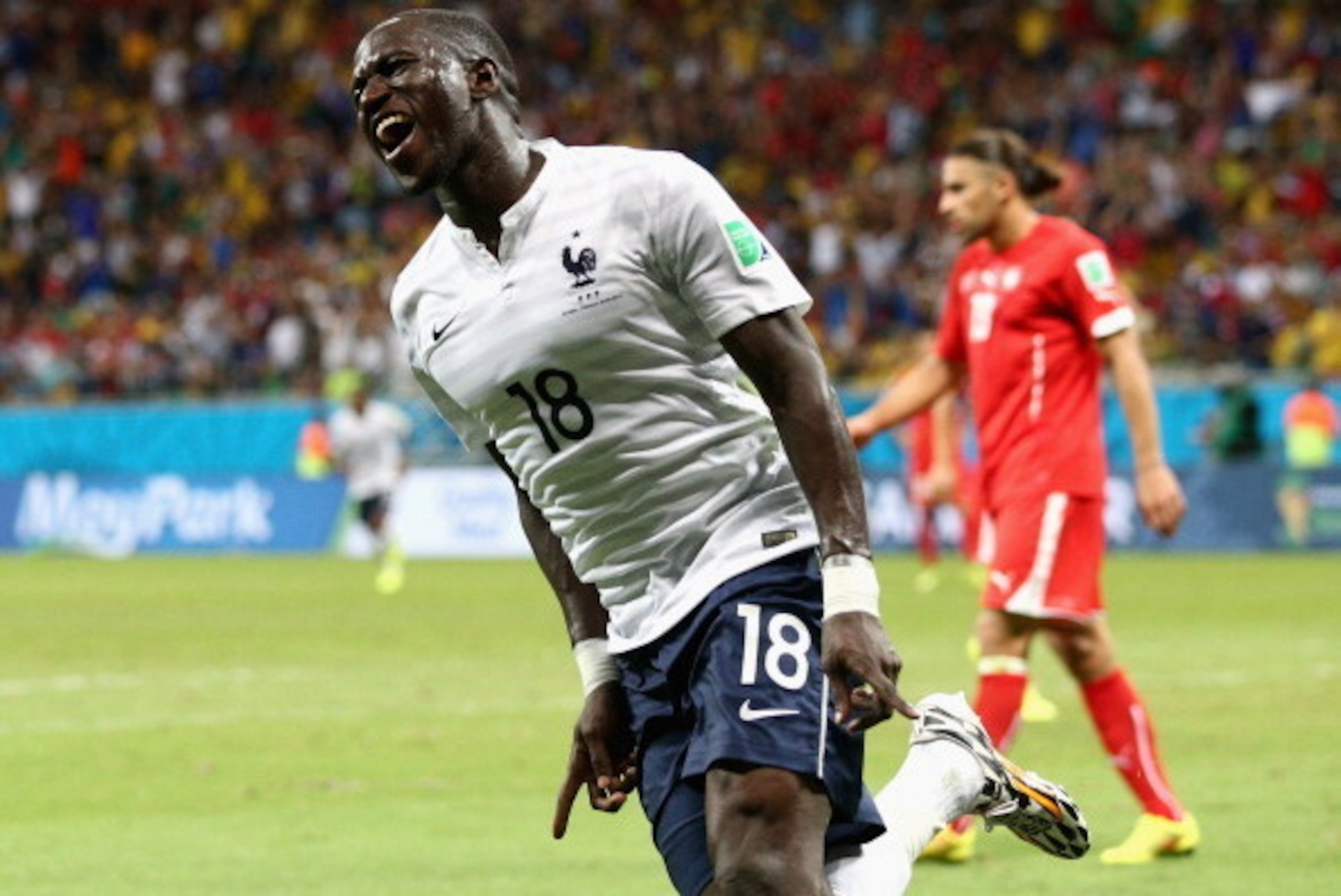 SALVADOR, BRAZIL - JUNE 20: Moussa Sissoko of France celebrates scoring his team's fifth goal during the 2014 FIFA World Cup Brazil Group E match between Switzerland and France at Arena Fonte Nova on June 20, 2014 in Salvador, Brazil. (Photo by Adam Pre SALVADOR, BRAZIL - JUNE 20: Moussa Sissoko of France celebrates scoring his team's fifth goal during the 2014 FIFA World Cup Brazil Group E match between Switzerland and France at Arena Fonte Nova on June 20, 2014 in Salvador, Brazil. (Photo by Adam Pre