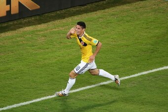 CUIABA, BRAZIL - JUNE 24:  James Rodriguez of Colombia celebrates scoring his team's fourth goal during the 2014 FIFA World Cup Brazil Group C match between Japan and Colombia at Arena Pantanal on June 24, 2014 in Cuiaba, Brazil.  (Photo by Warren Little/