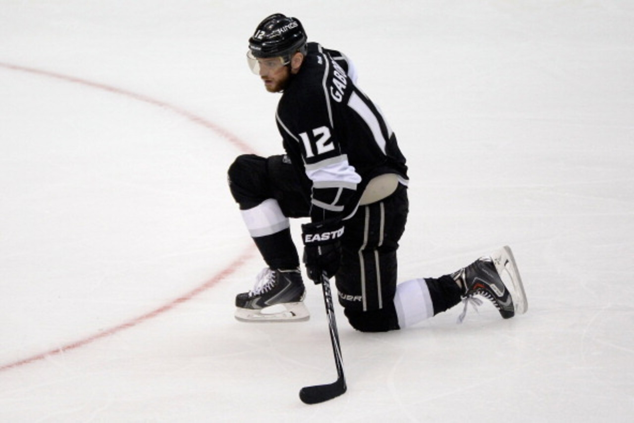 LOS ANGELES, CA - JUNE 04:  Marian Gaborik #12 of the Los Angeles Kings kneels on the ice against the New York Rangers during Game One of the 2014 NHL Stanley Cup Final at the Staples Center on June 4, 2014 in Los Angeles, California.  (Photo by Harry How