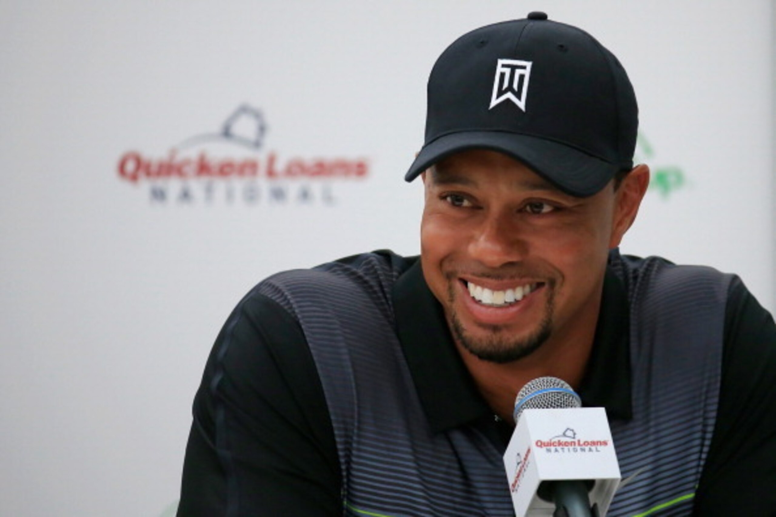 BETHESDA, MD - JUNE 24:  Tiger Woods talks with the media during a news conference at Congressional Country Club on June 24, 2014 in Bethesda, Maryland.  (Photo by Rob Carr/Getty Images)