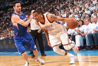 OKLAHOMA CITY, OK - MAY 13:  Thabo Sefolosha #25 of the Oklahoma City Thunder handles the ball against the Los Angeles Clippers in Game Five of the Western Conference Semifinals during the 2014 NBA Playoffs on May 13, 2014 at the Chesapeake Energy Arena i