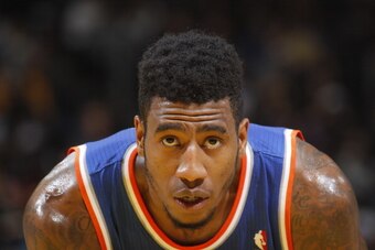 OAKLAND, CA - MARCH 30: Iman Shumpert #21 of the New York Knicks in a game against the Golden State Warriors on March 30, 2014 at Oracle Arena in Oakland, California. NOTE TO USER: User expressly acknowledges and agrees that, by downloading and or using t