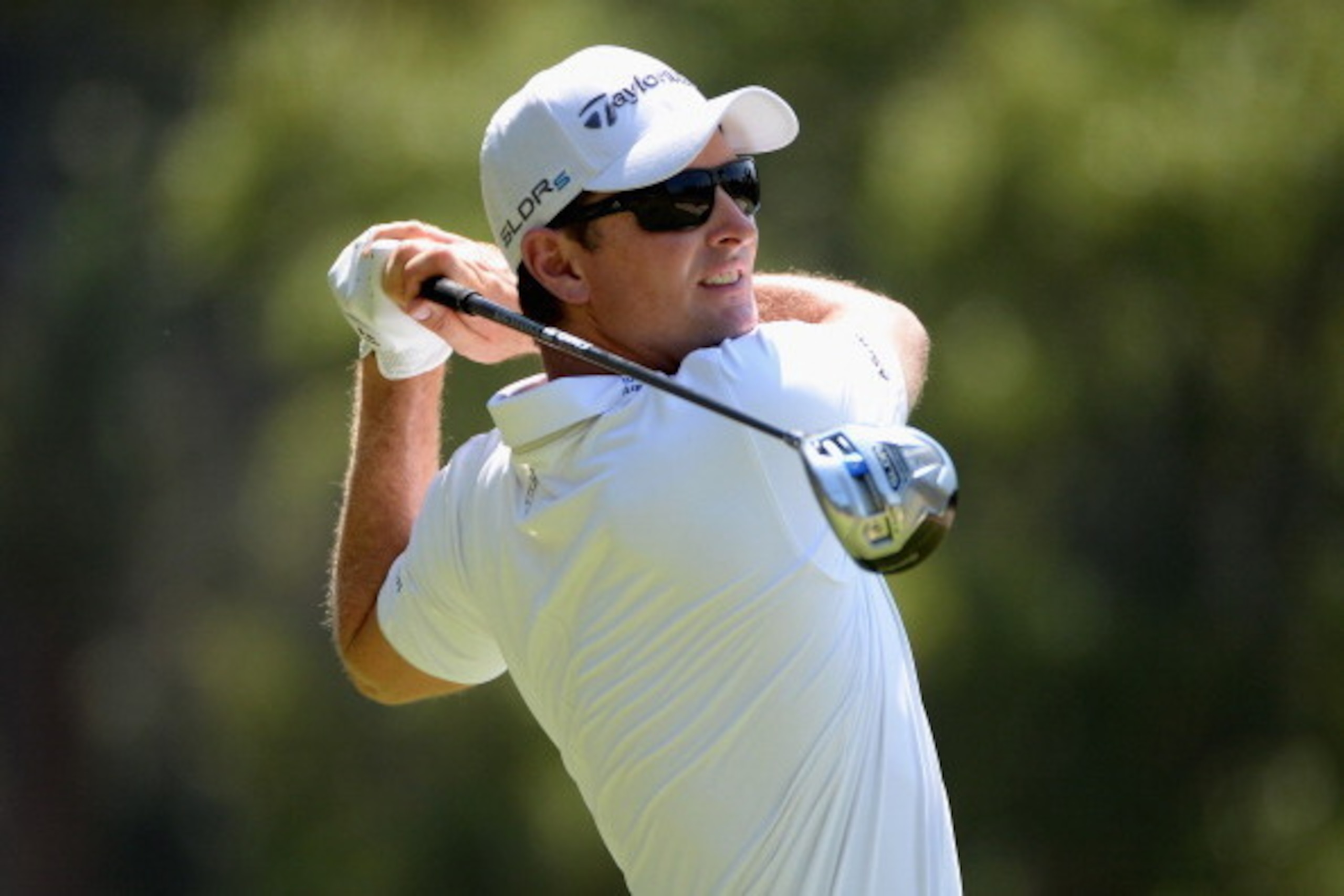 PINEHURST, NC - JUNE 15:  Justin Rose of England hits his tee shot on the second hole during the final round of the 114th U.S. Open at Pinehurst Resort & Country Club, Course No. 2 on June 15, 2014 in Pinehurst, North Carolina.  (Photo by Ross Kinnaird/Ge