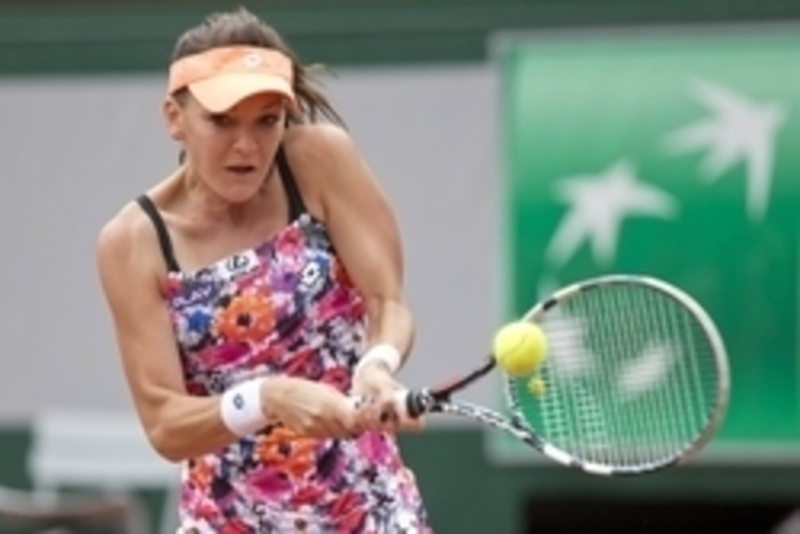 May 25, 2014; Paris, France; Agnieszka Radwanska (POL) in action against Shuai Zhang (CHN) on day one of the 2014 French Open at Roland Garros. Mandatory Credit: Susan Mullane-USA TODAY Sports