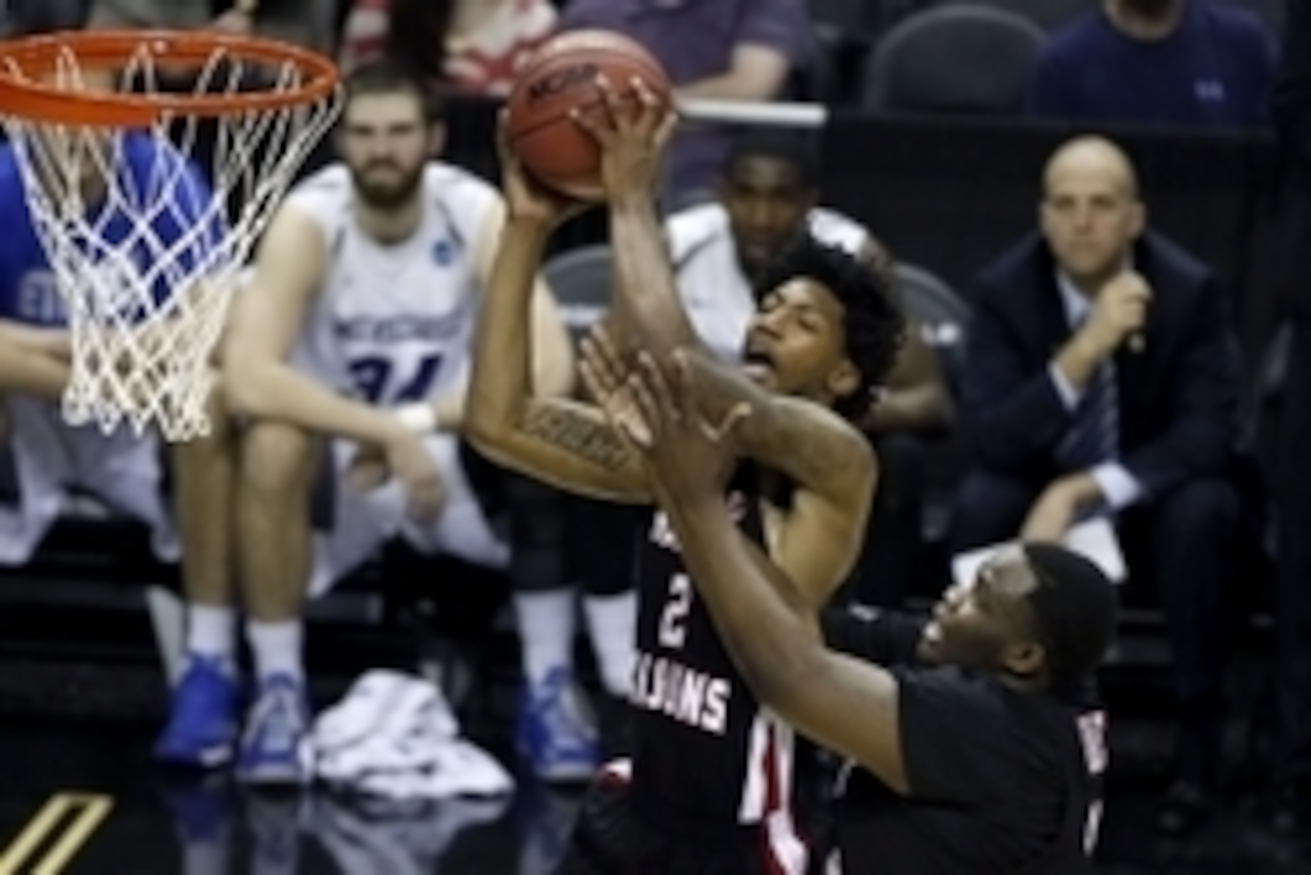 Mar 21, 2014; San Antonio, TX, USA; Louisiana Lafayette Ragin Cajuns guard Elfrid Payton (2) pulls down a rebound against the Creighton Bluejays in the second half of a men's college basketball game during the second round of the 2014 NCAA Tournament at A Mar 21, 2014; San Antonio, TX, USA; Louisiana Lafayette Ragin Cajuns guard Elfrid Payton (2) pulls down a rebound against the Creighton Bluejays in the second half of a men's college basketball game during the second round of the 2014 NCAA Tournament at A