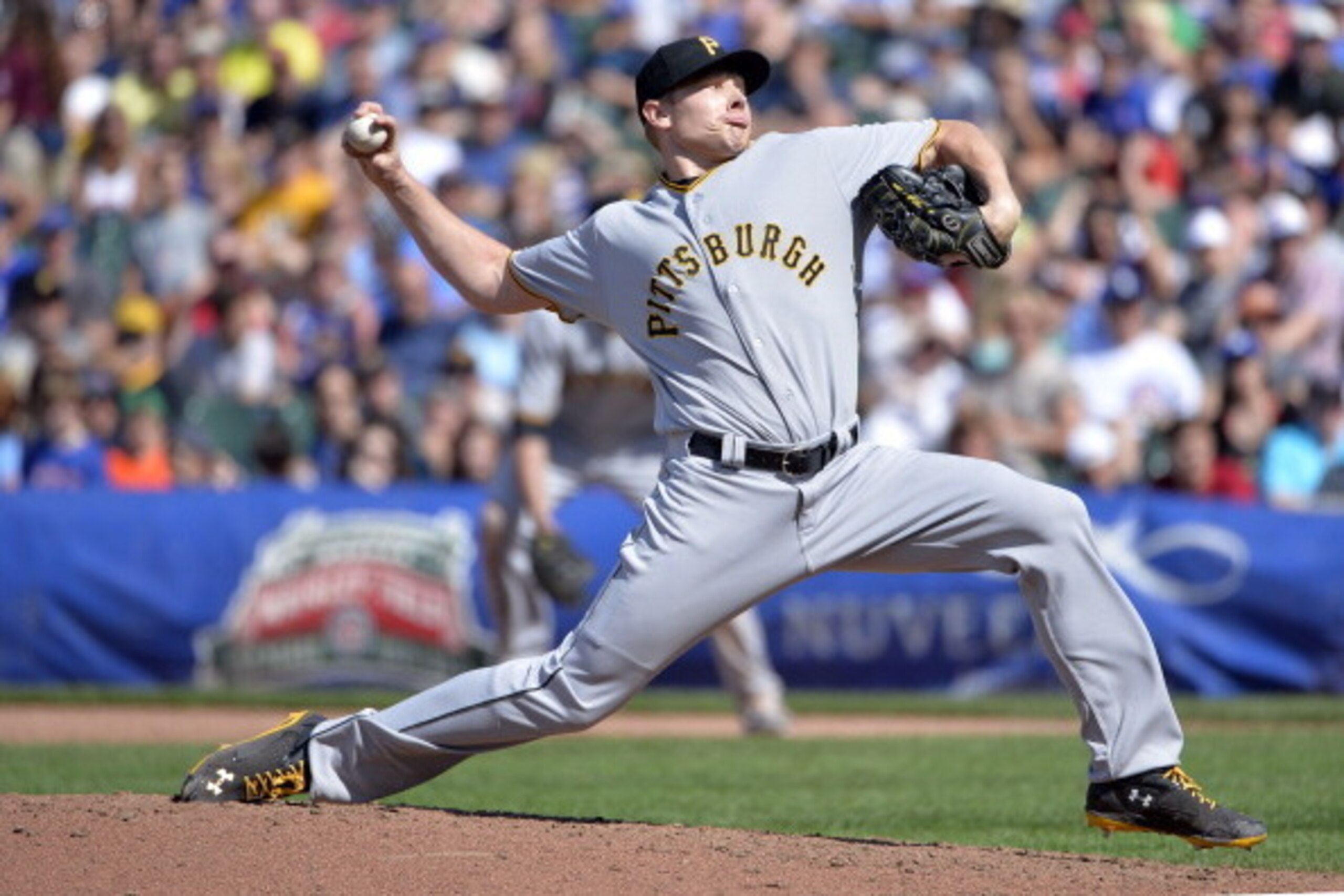 CHICAGO, IL - JUNE 22:  Relief pitcher Mark Melancon #35 of the Pittsburgh Pirates delivers a pitch during the ninth inning against the Chicago Cubs at Wrigley Field on June 22, 2014 in Chicago, Illinois. The Pirates defeated the Cubs 2-1.  (Photo by Bria
