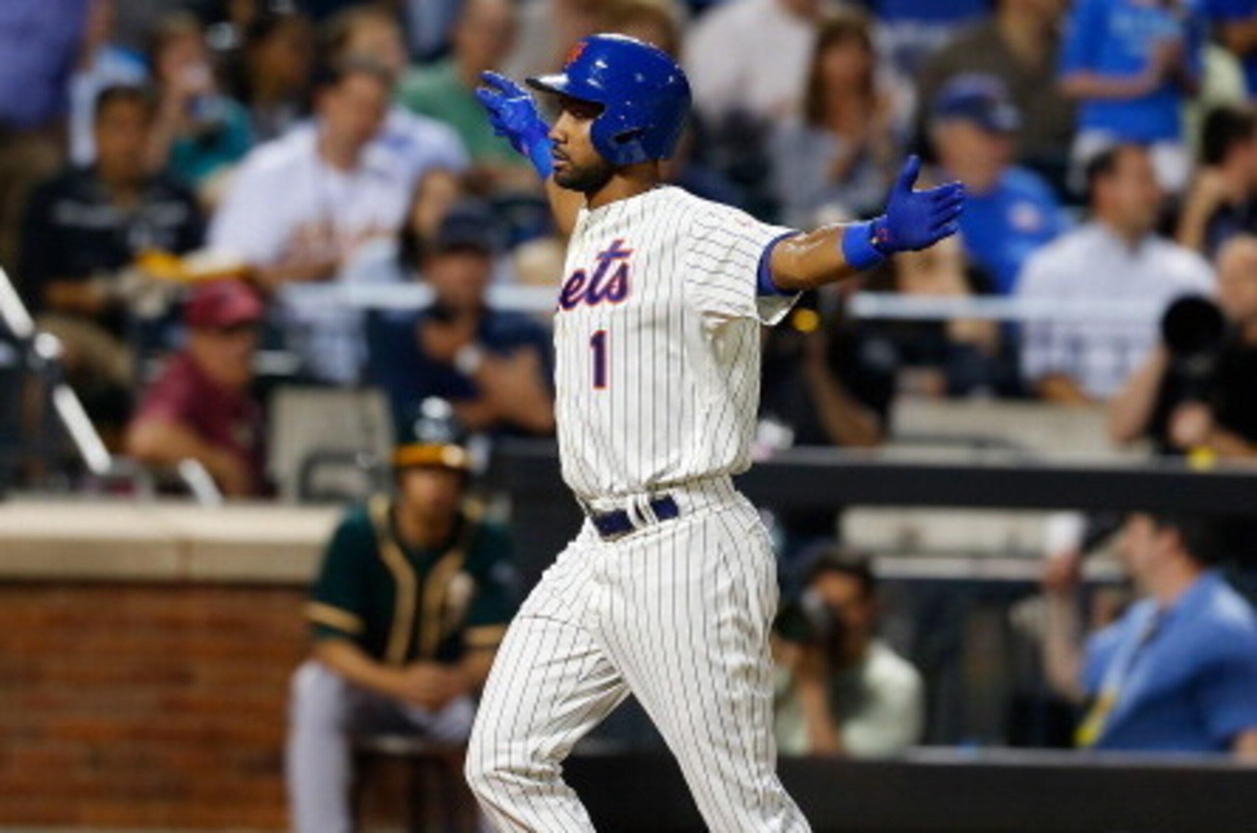 NEW YORK, NY - JUNE 24:  Chris Young #1 of the New York Mets celebrates after hitting a solo home run in the fifth inning against the Oakland Athletics at Citi Field on June 24, 2014 in the Flushing neighborhood of the Queens borough of New York City.  (P