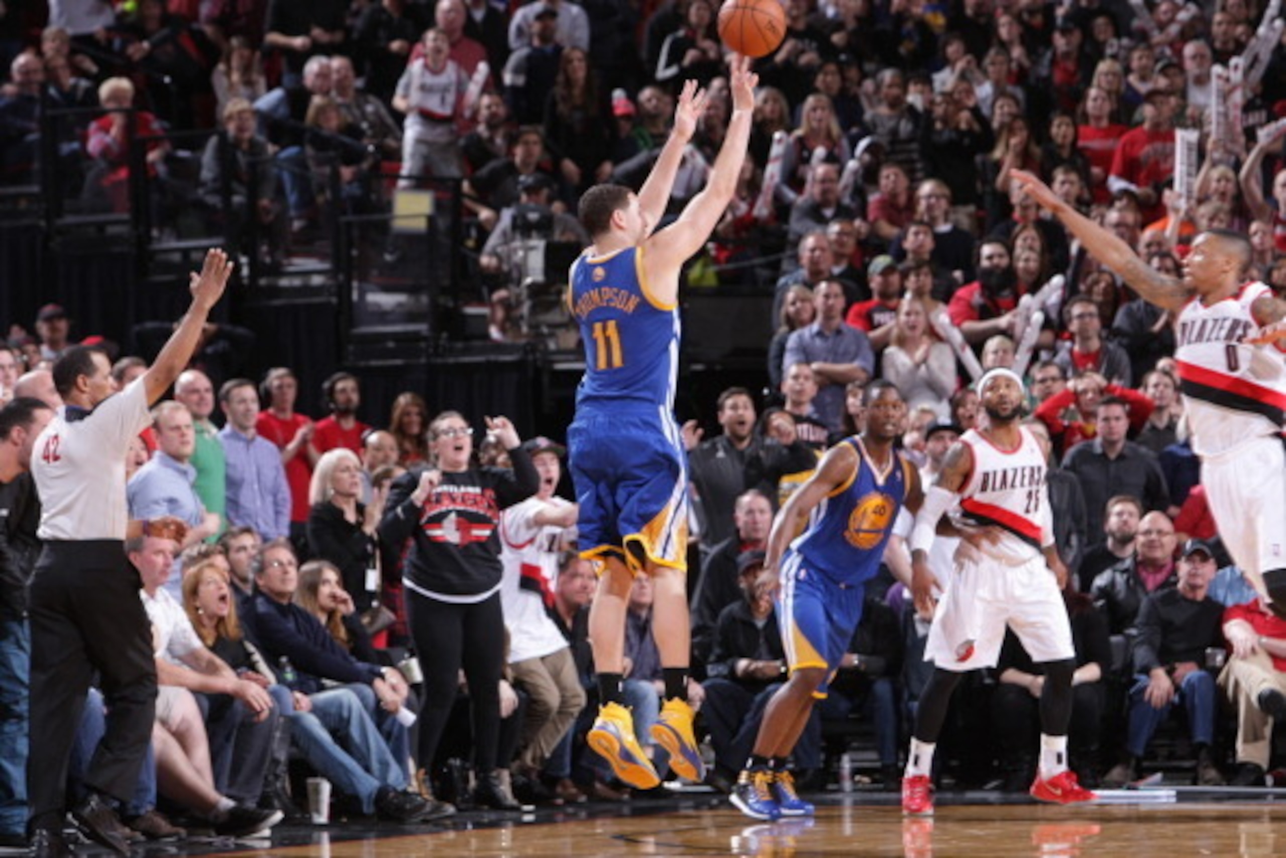 PORTLAND, OR - MARCH 16: Klay Thompson #11 of the Golden State Warriors shoots the ball during the game against the Portland Trail Blazers on March 16, 2014 at the Moda Center Arena in Portland, Oregon. NOTE TO USER: User expressly acknowledges and agrees