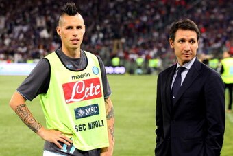 ROME, ITALY - MAY 03:  Marek Hamsik (L) and Team Manager Riccardo Bigon of SSC Napoli wait to speak with SSC Napoli fans before the TIM Cup final match between ACF Fiorentina and SSC Napoli at Olimpico Stadium on May 3, 2014 in Rome, Italy.  (Photo by Pao