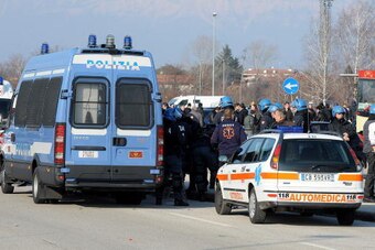 UDINE, ITALY - FEBRUARY 07:  Police are deployed during clashes betwen ultras  before the Serie A match between Udinese and Napoli at Stadio Friuli on February 7, 2010 in Udine, Italy.  (Photo by Dino Panato/Getty Images)