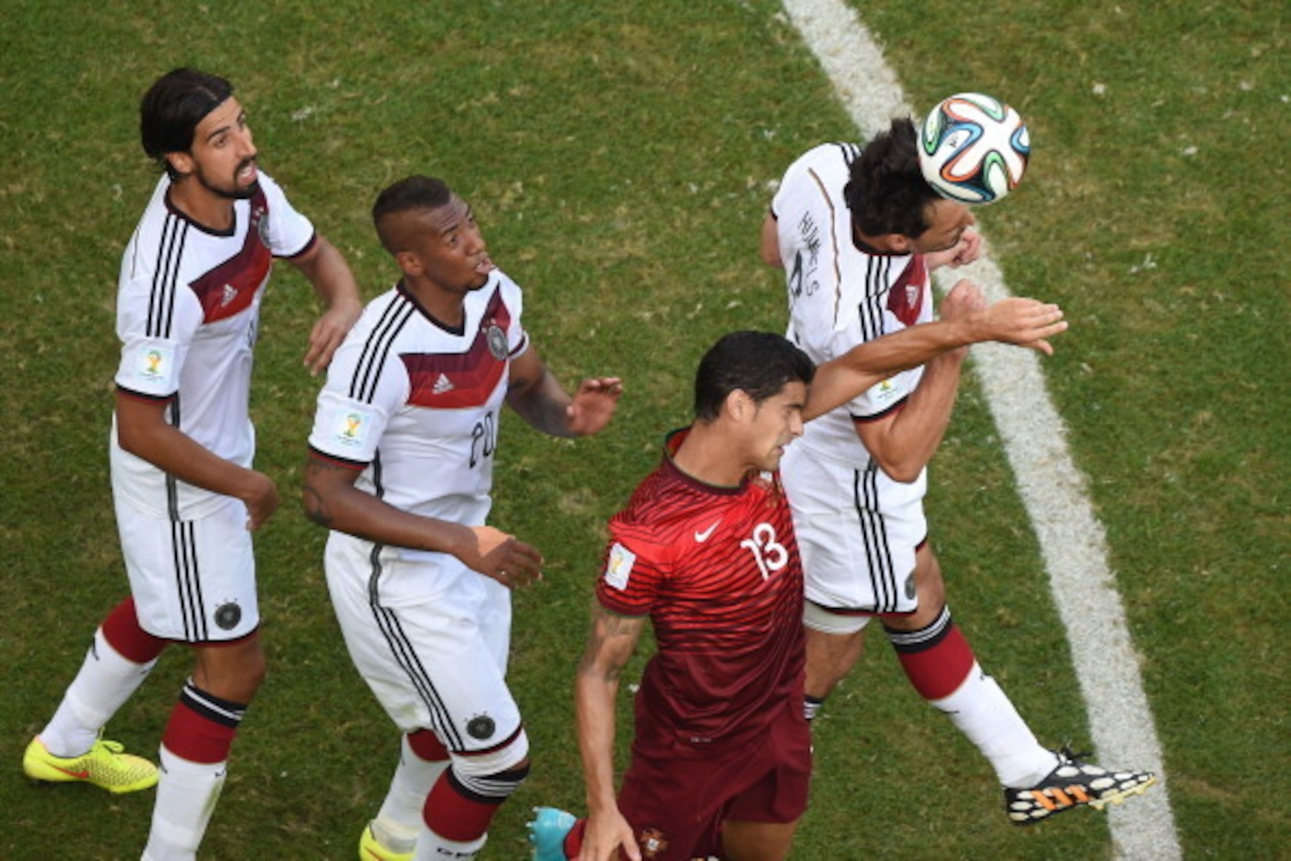 SALVADOR, BRAZIL - JUNE 16:  Mats Hummels of Germany and Ricardo Costa of Portugal go up for a header during the 2014 FIFA World Cup Brazil Group G match between Germany and Portugal at Arena Fonte Nova on June 16, 2014 in Salvador, Brazil.  (Photo by Fra