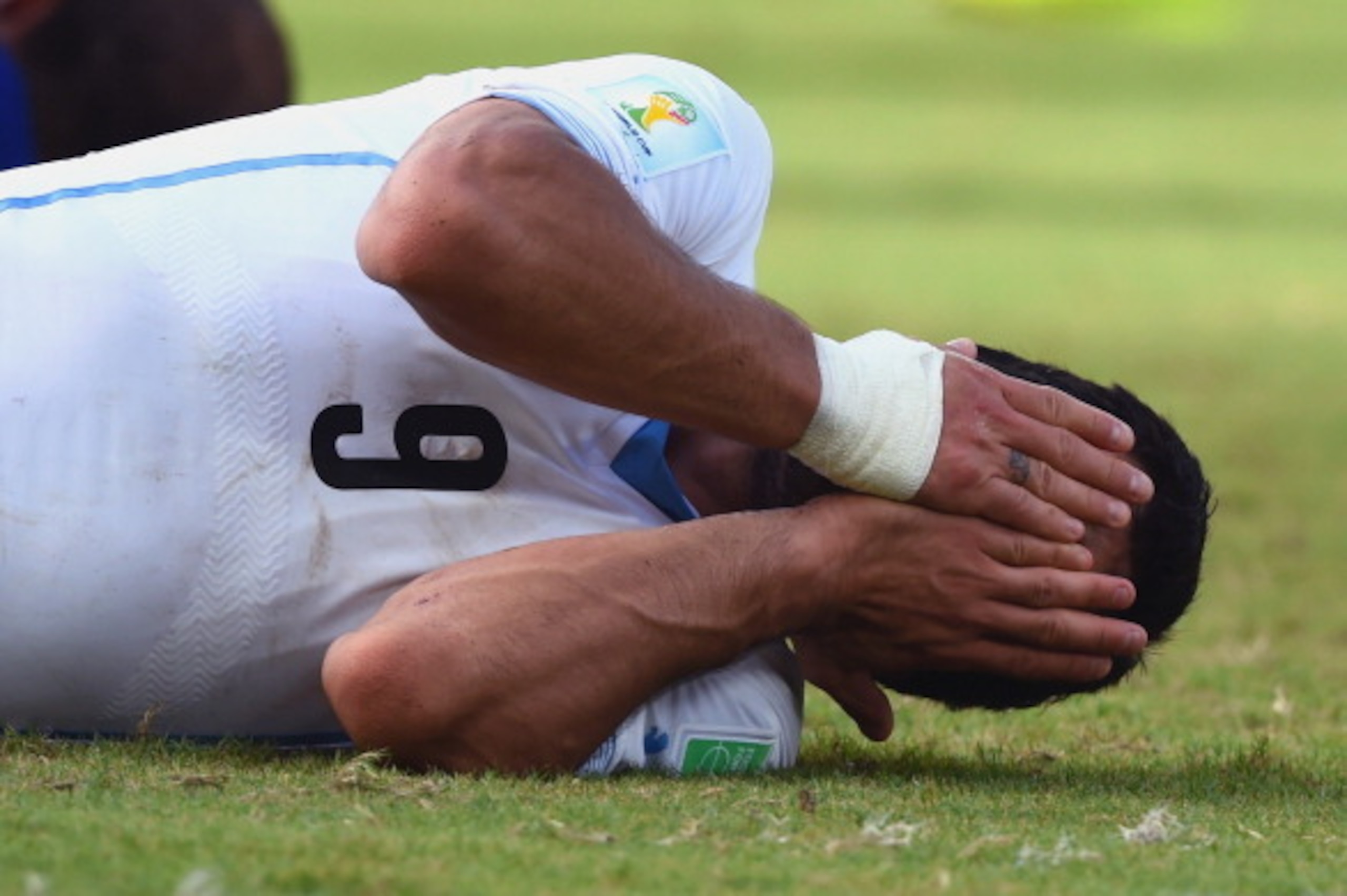 NATAL, BRAZIL - JUNE 24: Luis Suarez of Uruguay reacts during the 2014 FIFA World Cup Brazil Group D match between Italy and Uruguay at Estadio das Dunas on June 24, 2014 in Natal, Brazil. (Photo by Matthias Hangst/Getty Images) NATAL, BRAZIL - JUNE 24: Luis Suarez of Uruguay reacts during the 2014 FIFA World Cup Brazil Group D match between Italy and Uruguay at Estadio das Dunas on June 24, 2014 in Natal, Brazil. (Photo by Matthias Hangst/Getty Images)