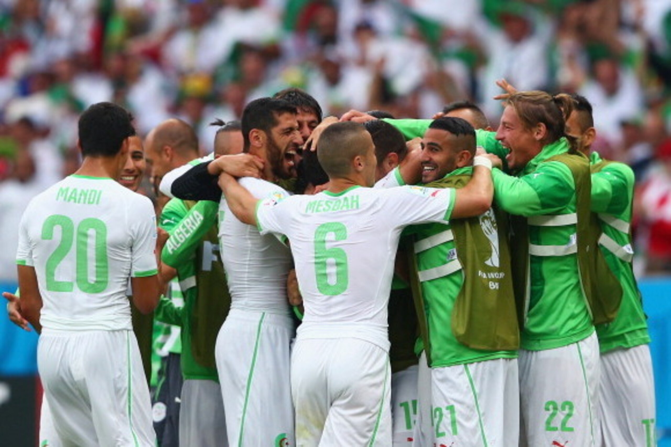 PORTO ALEGRE, BRAZIL - JUNE 22:  Abdelmoumene Djabou of Algeria celebrates scoring his team's third goal with teammates during the 2014 FIFA World Cup Brazil Group H match between South Korea and Algeria at Estadio Beira-Rio on June 22, 2014 in Porto Aleg