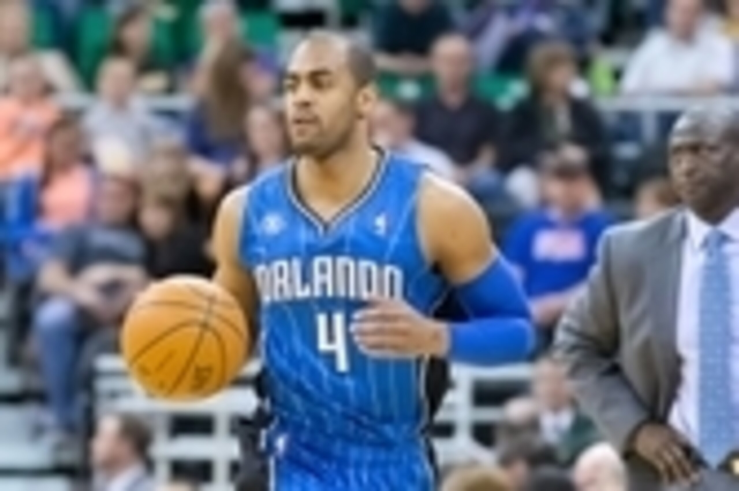 Mar 22, 2014; Salt Lake City, UT, USA; Orlando Magic guard Arron Afflalo (4) dribbles up the court during the first half against the Utah Jazz at EnergySolutions Arena. Mandatory Credit: Russ Isabella-USA TODAY Sports