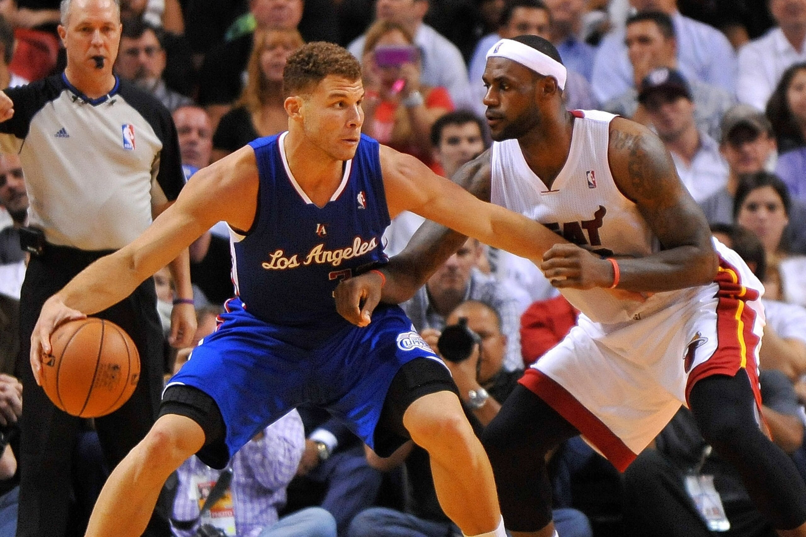 Nov 7, 2013; Miami, FL, USA; Los Angeles Clippers power forward Blake Griffin (32) is pressured by Miami Heat small forward LeBron James (6) during the second half at American Airlines Arena. Mandatory Credit: Steve Mitchell-USA TODAY Sports