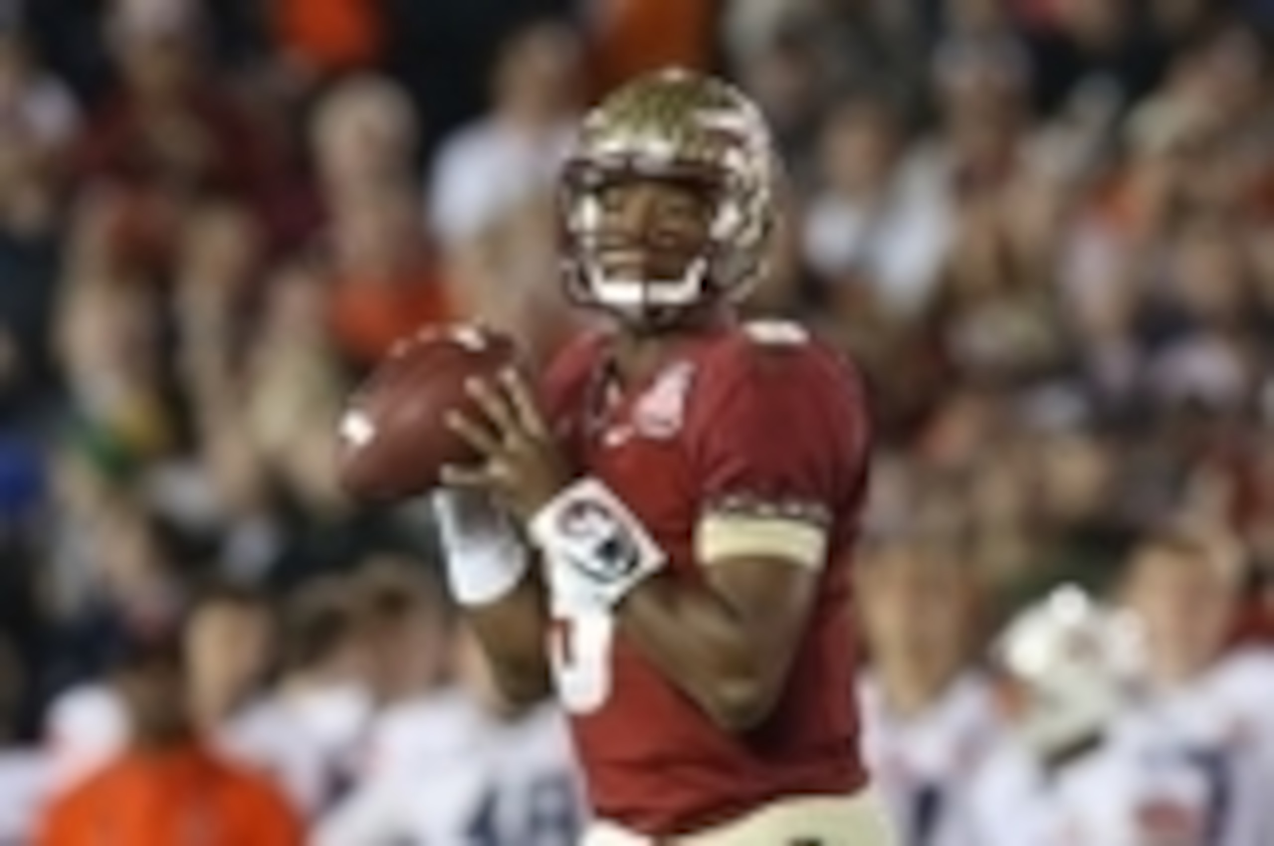 Jan 6, 2014; Pasadena, CA, USA; Florida State Seminoles quarterback Jameis Winston (5) in action against the Auburn Tigers for the 2014 BCS National Championship game at the Rose Bowl. Mandatory Credit: Matthew Emmons-USA TODAY Sports