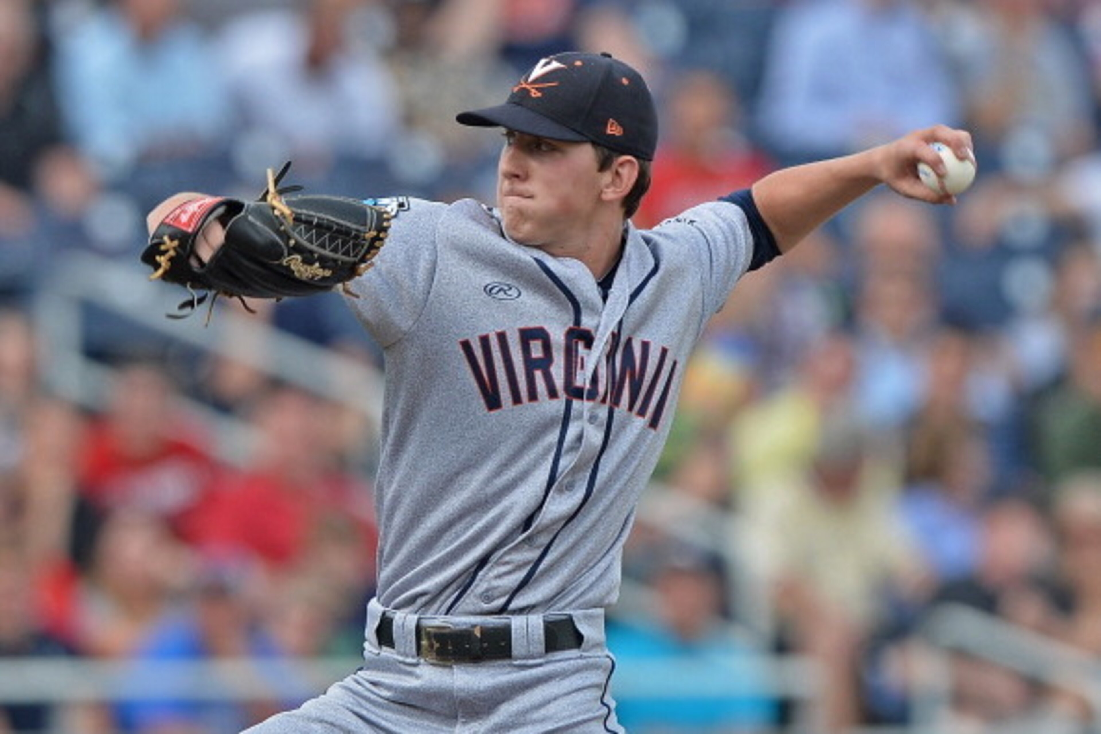 OMAHA, NE - JUNE 24:  Brandon Waddell #20 of the Virginia Cavaliers delivers a pitch against the Vanderbilt Commodores in the first inning during game two of the College World Series Championship Series on June 24, 2014 at TD Ameritrade Park in Omaha, Neb