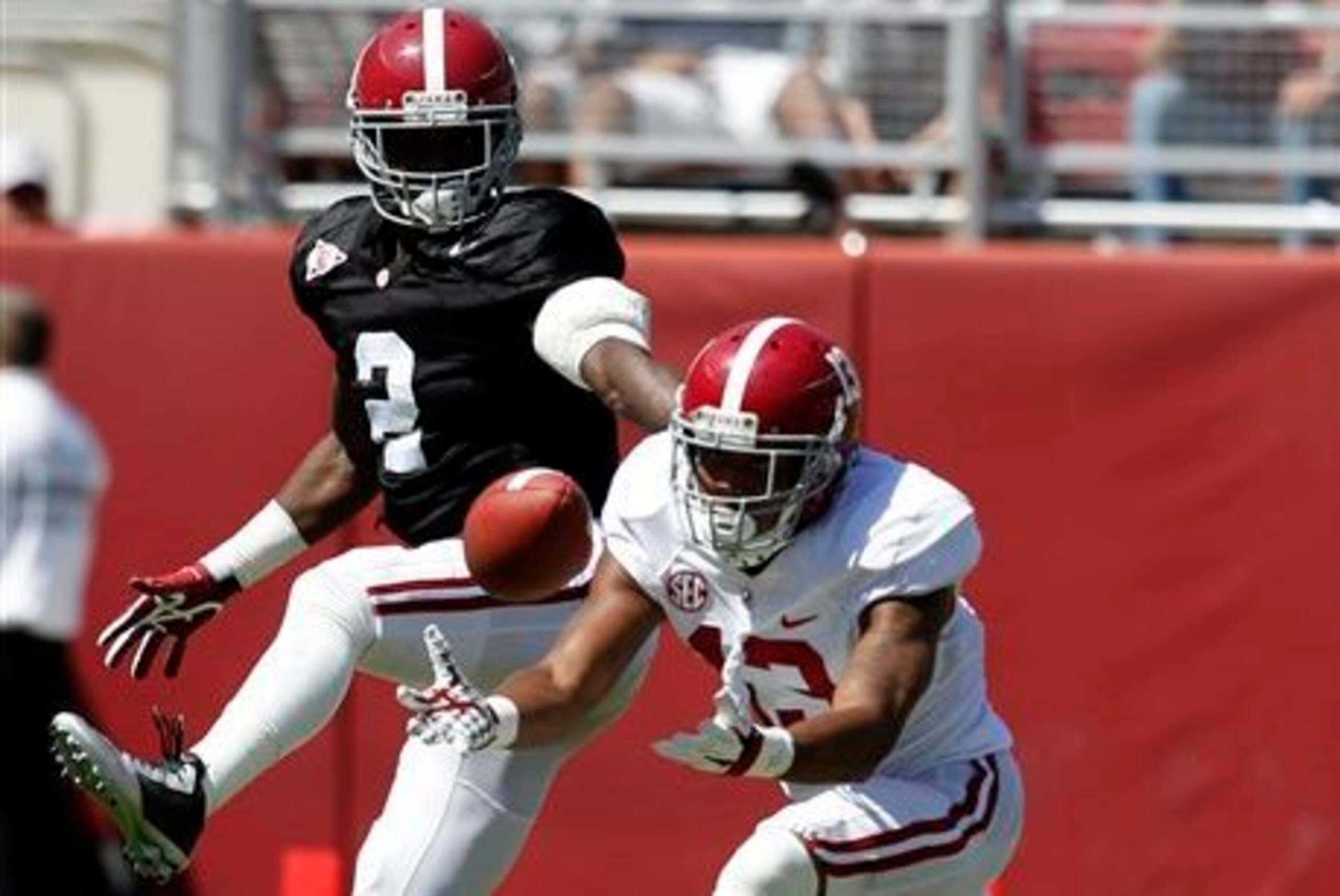 Alabama DB Tony Brown (left)