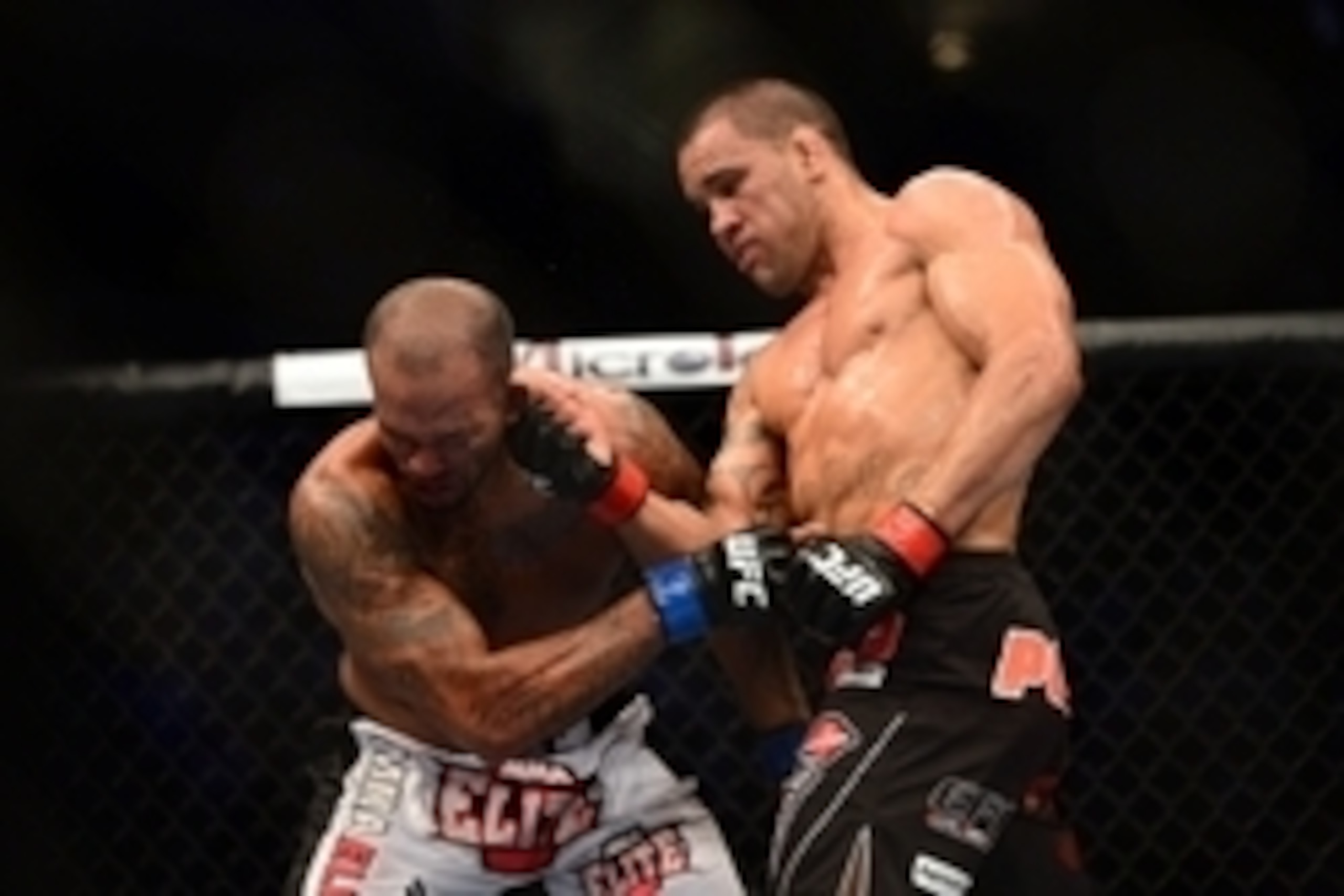 July 11, 2012; San Jose, CA, USA; James Te Huna (right) fights Joey Beltran (left) during the light heavyweight bout of the UFC on Fuel TV at HP Pavilion. Mandatory Credit: Kyle Terada-USA TODAY Sports