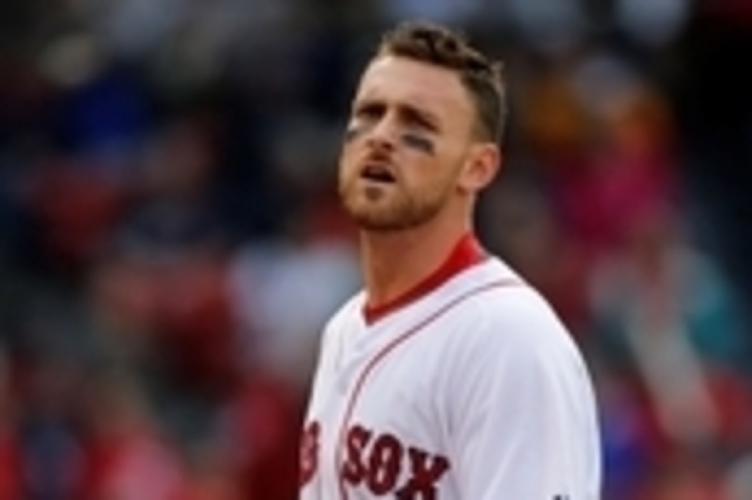 May 4, 2014; Boston, MA, USA; Boston Red Sox third baseman Will Middlebrooks (16) reacts to being tagged out by Oakland Athletics third baseman Josh Donaldson (not pictured) on a fielders choice during the tenth inning at Fenway Park.  The Oakland Athleti