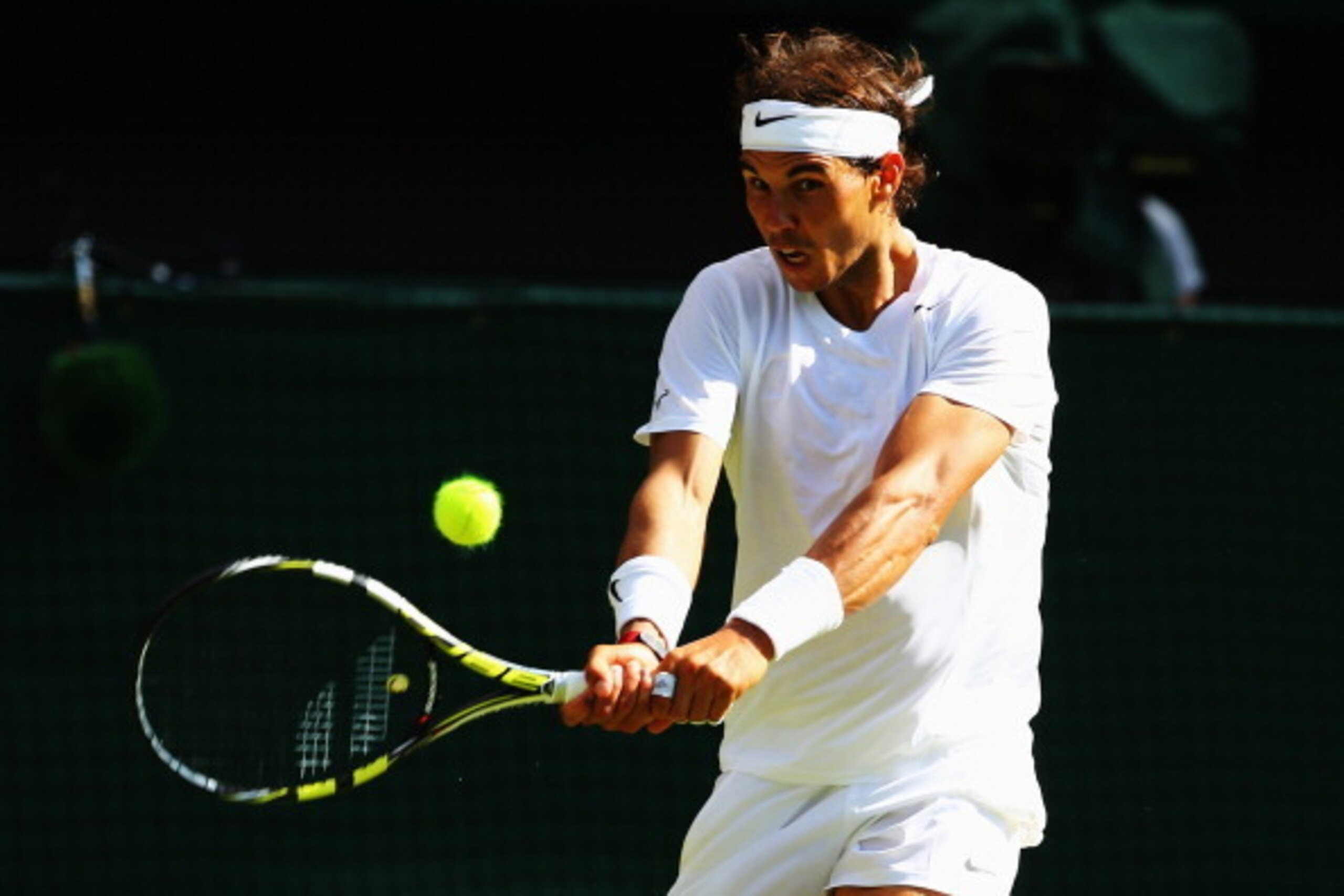 LONDON, ENGLAND - JUNE 24:  Rafael Nadal of Spain in action during his Gentlemen's Singles first round match against Martin Klizan of Slovakia on day two of the Wimbledon Lawn Tennis Championships at the All England Lawn Tennis and Croquet Club at Wimbled