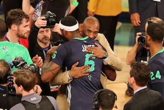 NEW ORLEANS, LA - FEBRUARY 16:  LeBron James #6 of the Eastern Conference All-Stars and Kobe Bryant #24 of the Western Conference All-Stars greet after the 2014 NBA All-Star Game as part of the 2014 All-Star Weekend at Smoothie King Center on February 16,