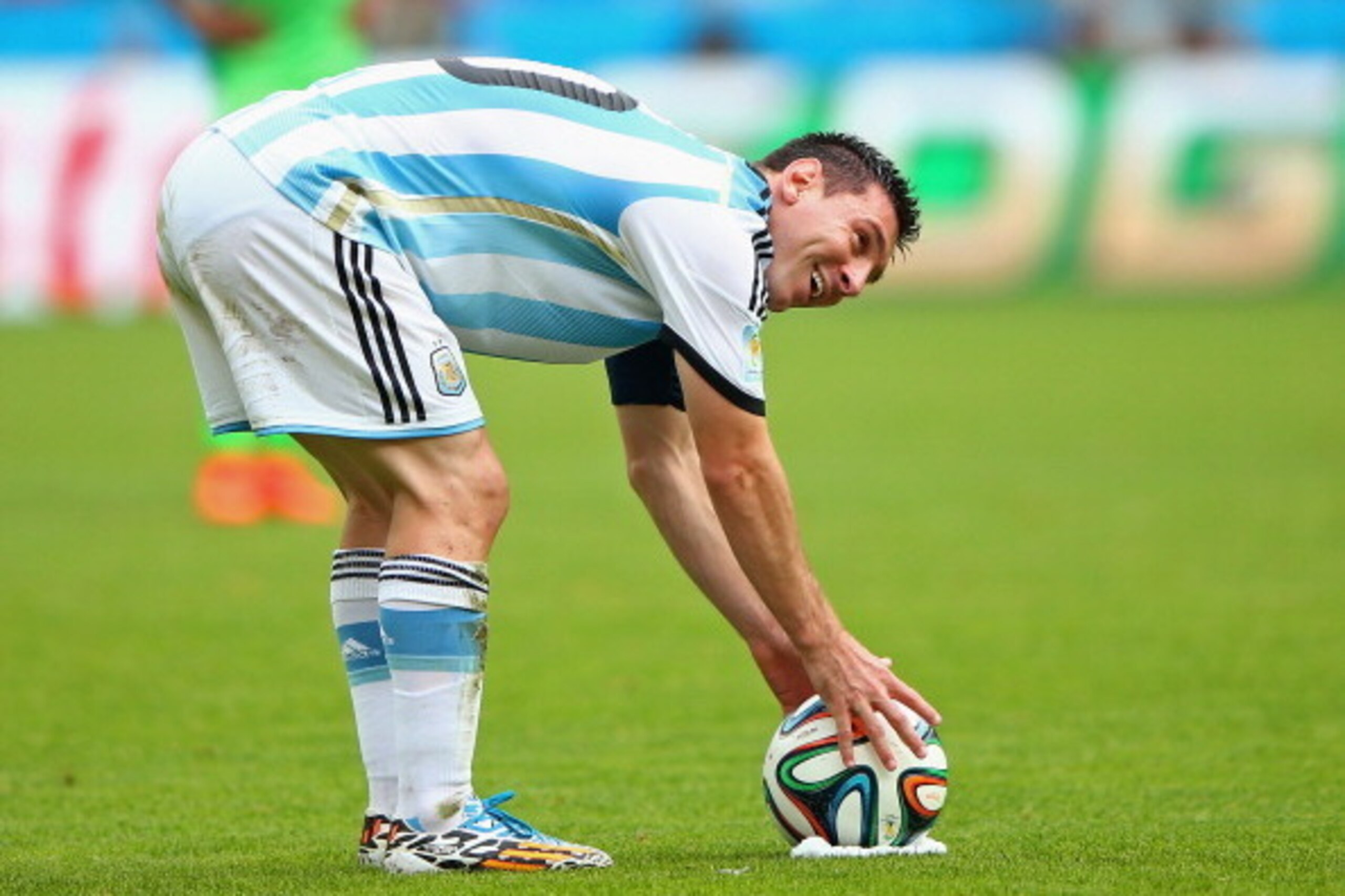 PORTO ALEGRE, BRAZIL - JUNE 25: Lionel Messi of Argentina prepares to take a free kick during the 2014 FIFA World Cup Brazil Group F match between Nigeria and Argentina at Estadio Beira-Rio on June 25, 2014 in Porto Alegre, Brazil.  (Photo by Ian Walton/G