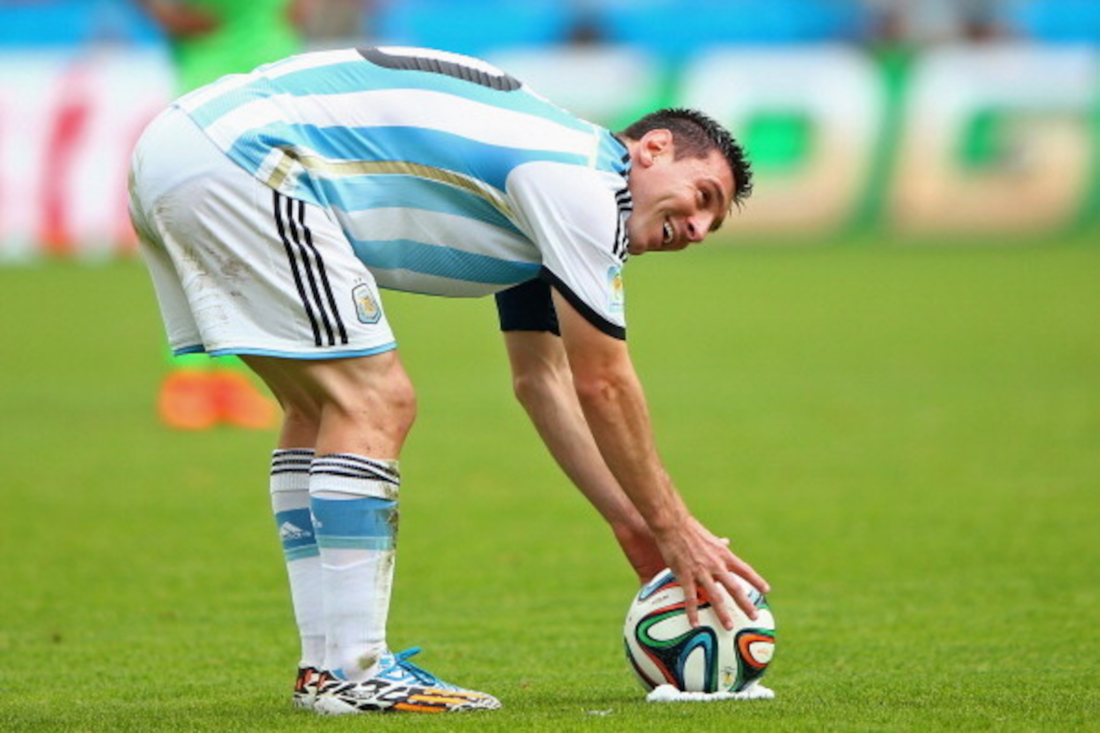 PORTO ALEGRE, BRAZIL - JUNE 25: Lionel Messi of Argentina prepares to take a free kick during the 2014 FIFA World Cup Brazil Group F match between Nigeria and Argentina at Estadio Beira-Rio on June 25, 2014 in Porto Alegre, Brazil.  (Photo by Ian Walton/G
