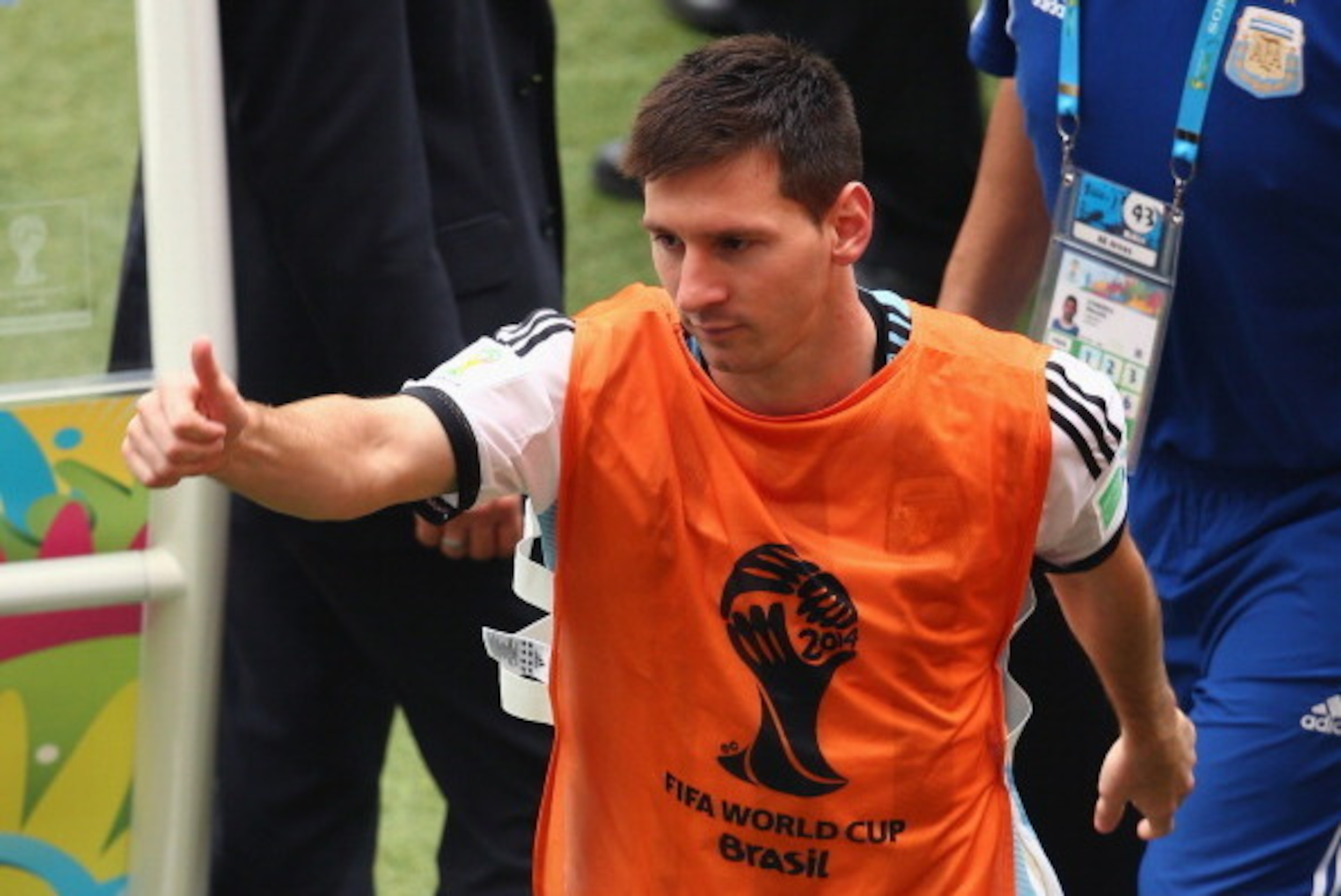 PORTO ALEGRE, BRAZIL - JUNE 25:  Lionel Messi of Argentina acknowledges the fans as he leaves the field after defeating Nigeria 3-2 during the 2014 FIFA World Cup Brazil Group F match between Nigeria and Argentina at Estadio Beira-Rio on June 25, 2014 in 
