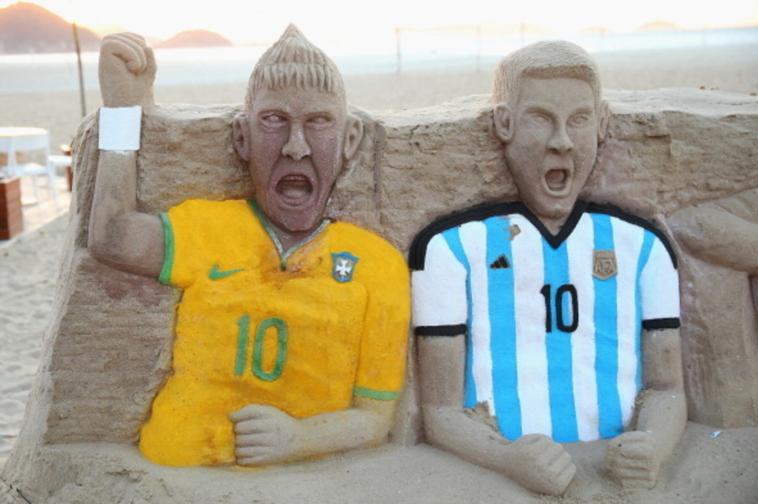 RIO DE JANEIRO, BRAZIL - JUNE 09: A sandcastle of Neymar of Brazil and Lionel Messi of Argentina on Copacabana beach on June 9, 2014 in Rio de Janeiro, Brazil.  (Photo by Julian Finney/Getty Images)