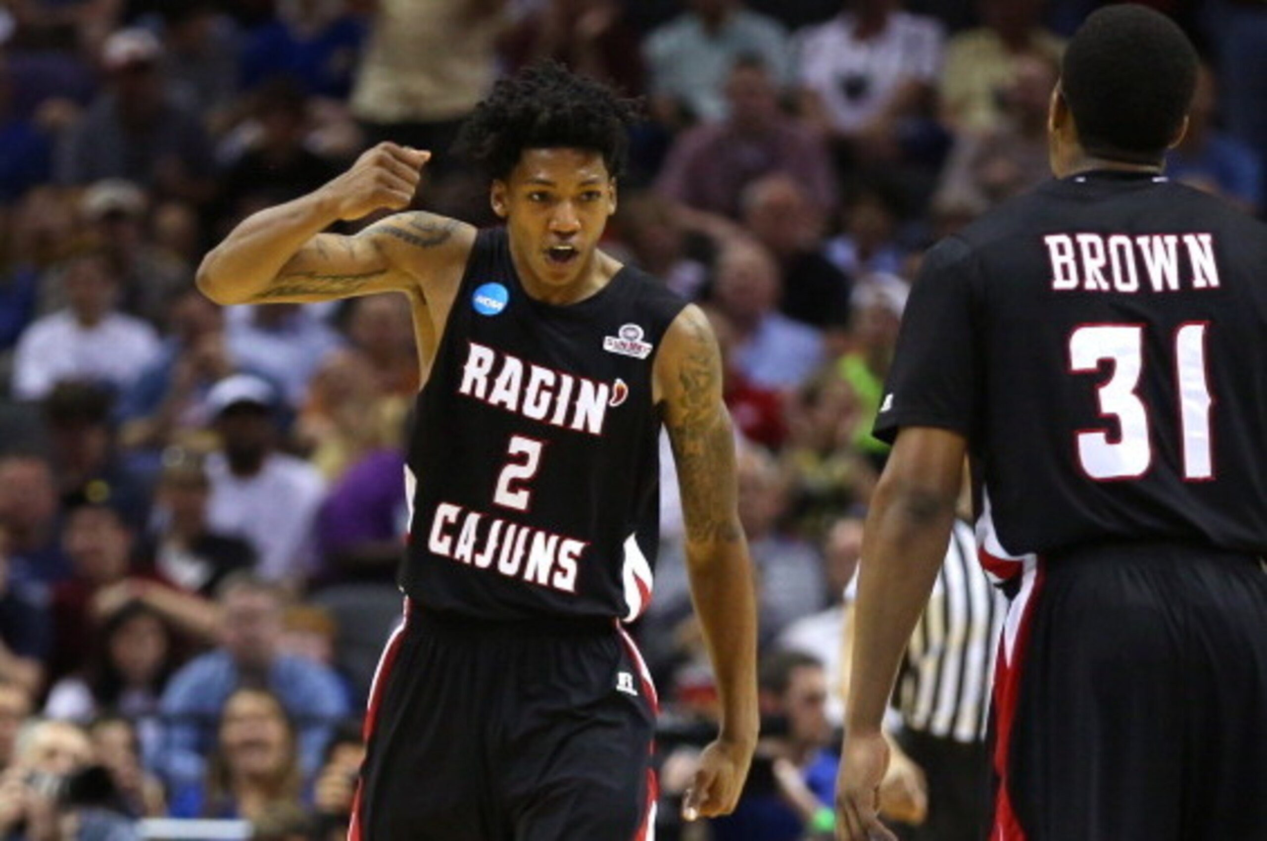 SAN ANTONIO, TX - MARCH 21:  Elfrid Payton #2 of the Louisiana Lafayette Ragin Cajuns celebrates after a play in the second half against the Creighton Bluejays during the second round of the 2014 NCAA Men's Basketball Tournament at AT&T Center on March 21