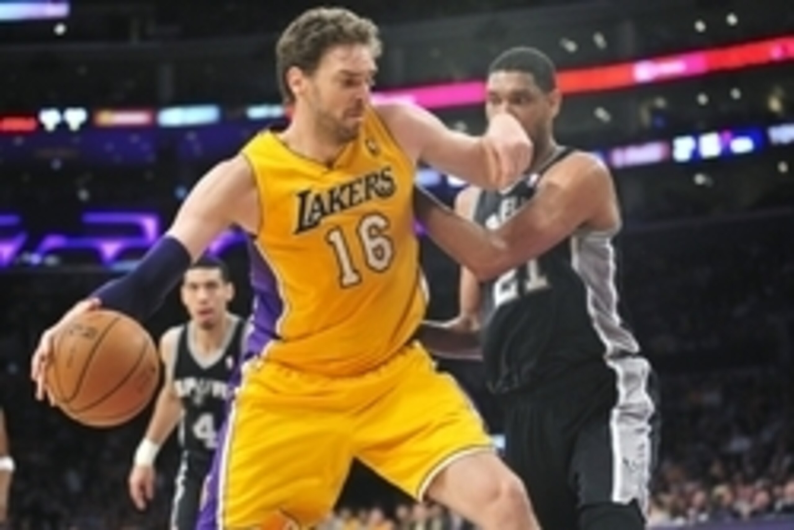 March 19, 2014; Los Angeles, CA, USA; Los Angeles Lakers center Pau Gasol (16) moves to the basket against the San Antonio Spurs during the first half at Staples Center. Mandatory Credit: Gary A. Vasquez-USA TODAY Sports