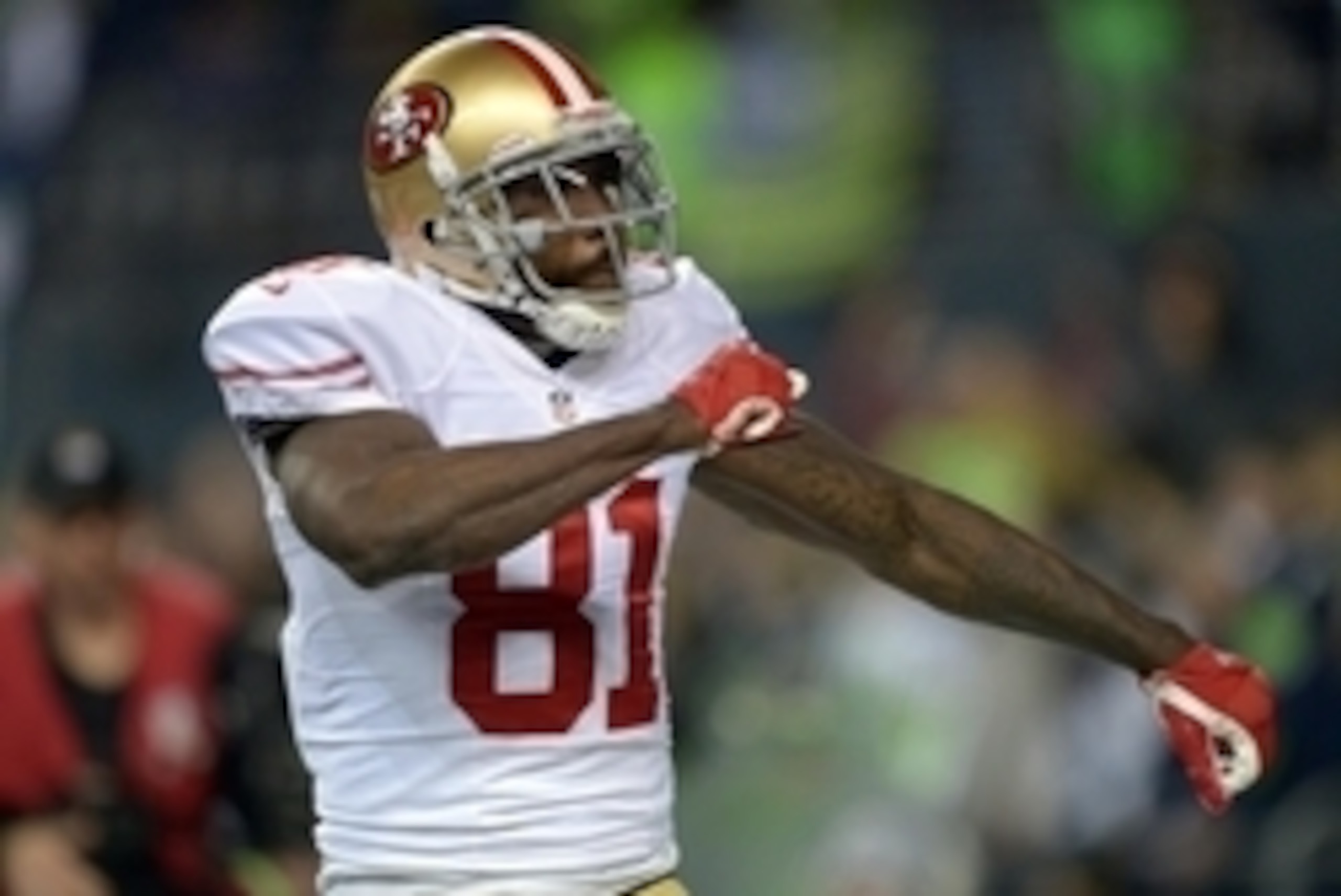 Jan 19, 2014; Seattle, WA, USA; San Francisco 49ers wide receiver Anquan Boldin (81) celebrates after catching a touchdown pass against the Seattle Seahawks in the third quarter of the 2013 NFC Championship football game at CenturyLink Field. Mandatory Cr