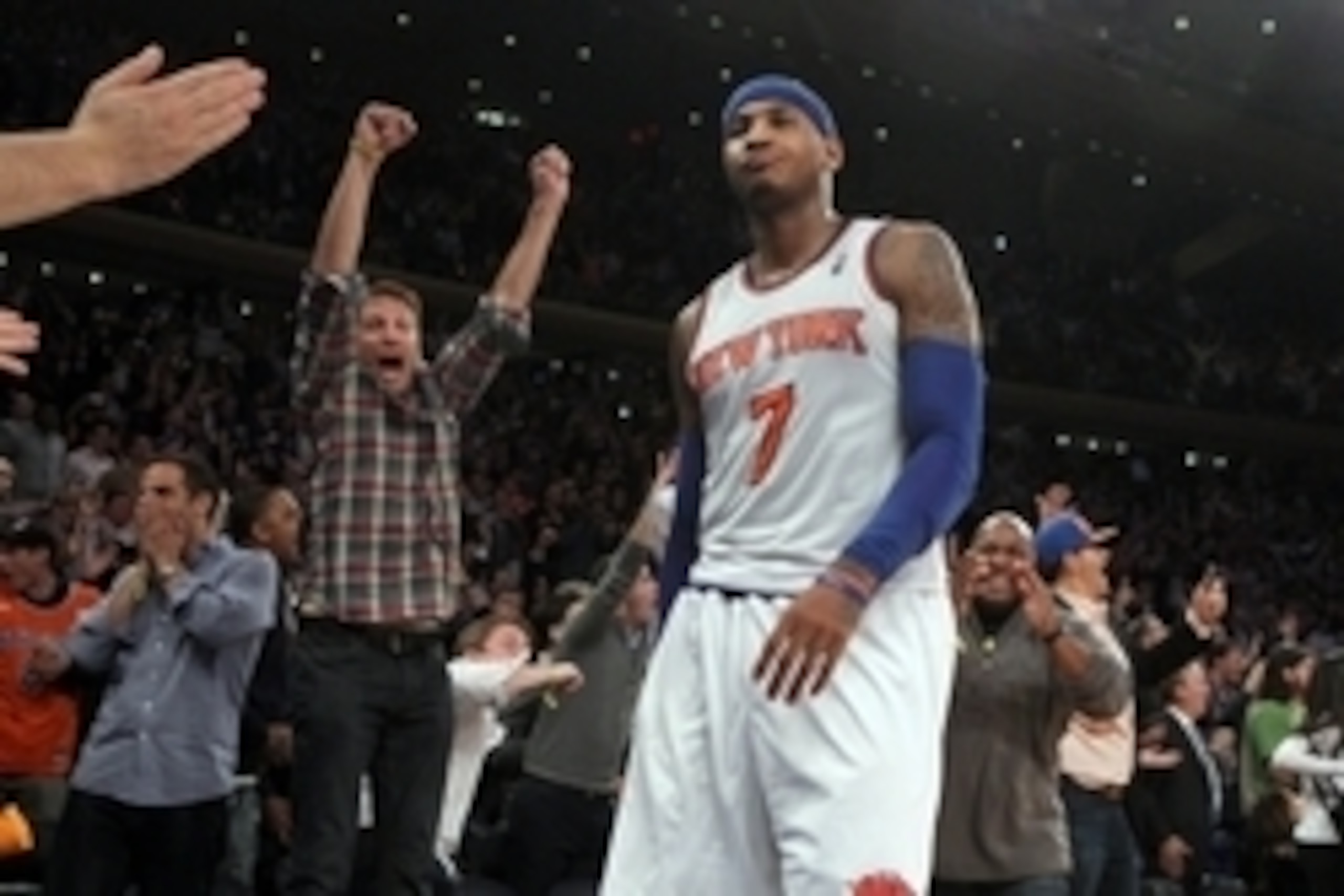 Nov 14, 2013; New York, NY, USA; New York Knicks small forward Carmelo Anthony (7) and fans react after he was fouled late during the fourth quarter of a game against the Houston Rockets at Madison Square Garden. Mandatory Credit: Brad Penner-USA TODAY Sp