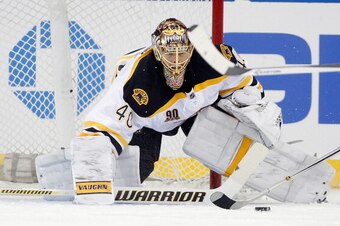 NEW YORK, NY - MARCH 02: Tuukka Rask #40 of the Boston Bruins makes a save on a shot by the New York Rangers in the first period of an NHL hockey game at Madison Square Garden on March 2, 2014 in New York City.  (Photo by Paul Bereswill/Getty Images)