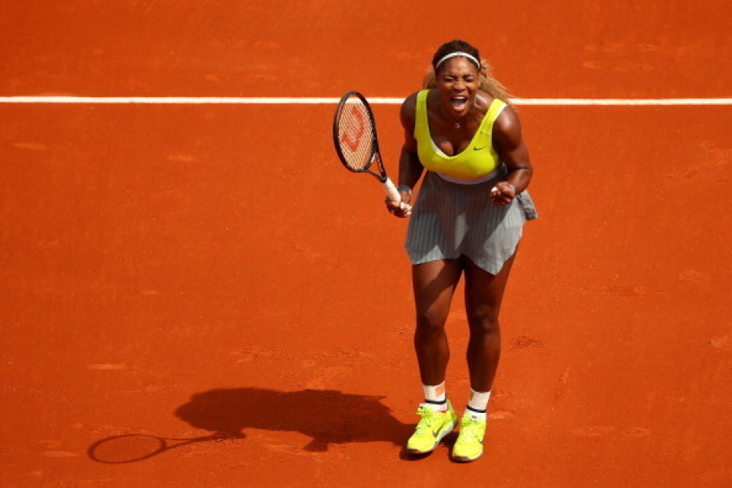 PARIS, FRANCE - MAY 25:  Serena Williams of the United States celebrates a point during her women's singles match against Alize Lim of France on day one of the French Open at Roland Garros on May 25, 2014 in Paris, France.  (Photo by Clive Brunskill/Getty