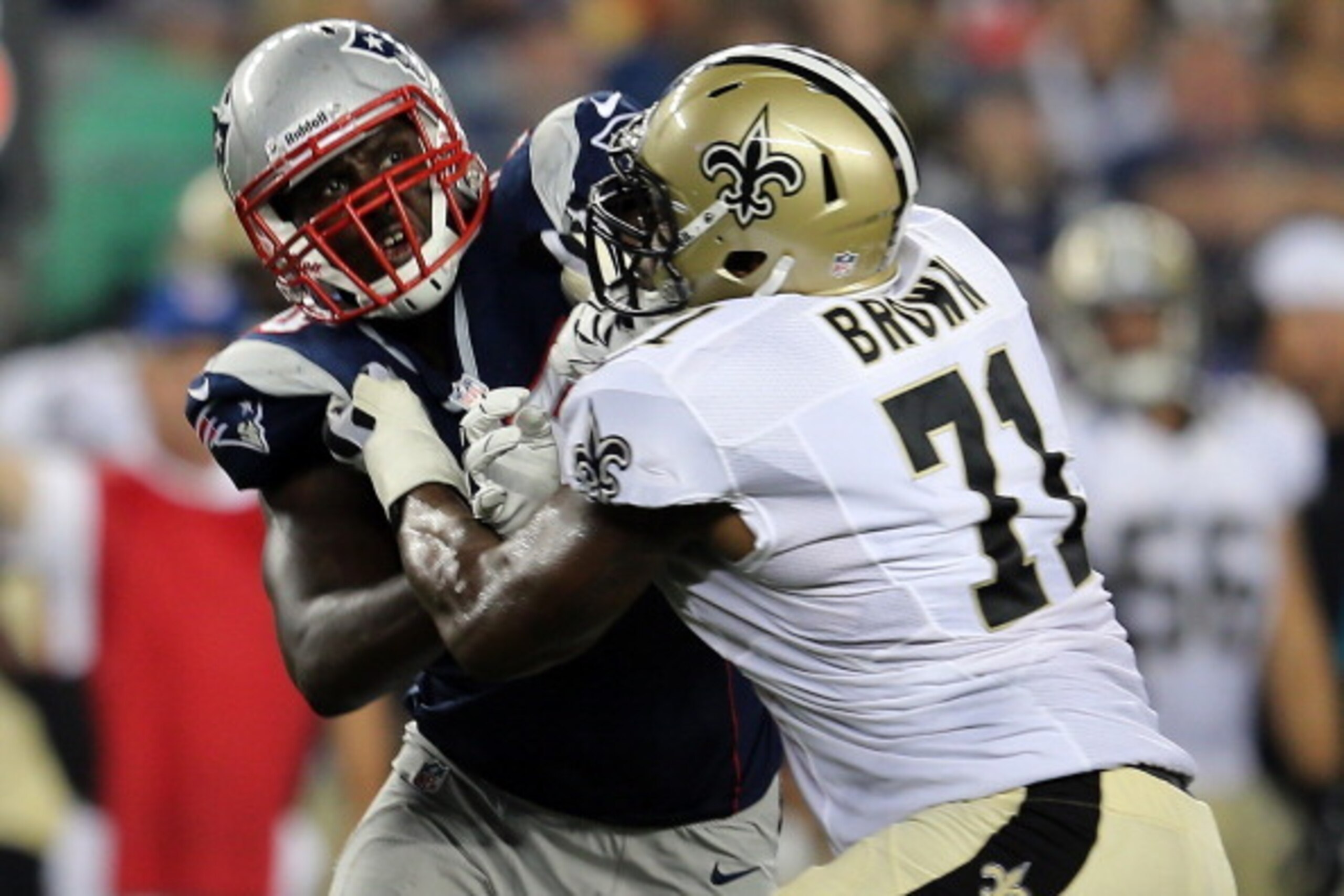 FOXBORO, MA - AUGUST 9: Chandler Jones #95 of the New England Patriots tries to get by the defense of Charles Brown #71 of the New Orleans Saints in the first half at Gillette Stadium on August 9, 2012 in Foxboro, Massachusetts. (Photo by Jim Rogash/Get FOXBORO, MA - AUGUST 9: Chandler Jones #95 of the New England Patriots tries to get by the defense of Charles Brown #71 of the New Orleans Saints in the first half at Gillette Stadium on August 9, 2012 in Foxboro, Massachusetts. (Photo by Jim Rogash/Get