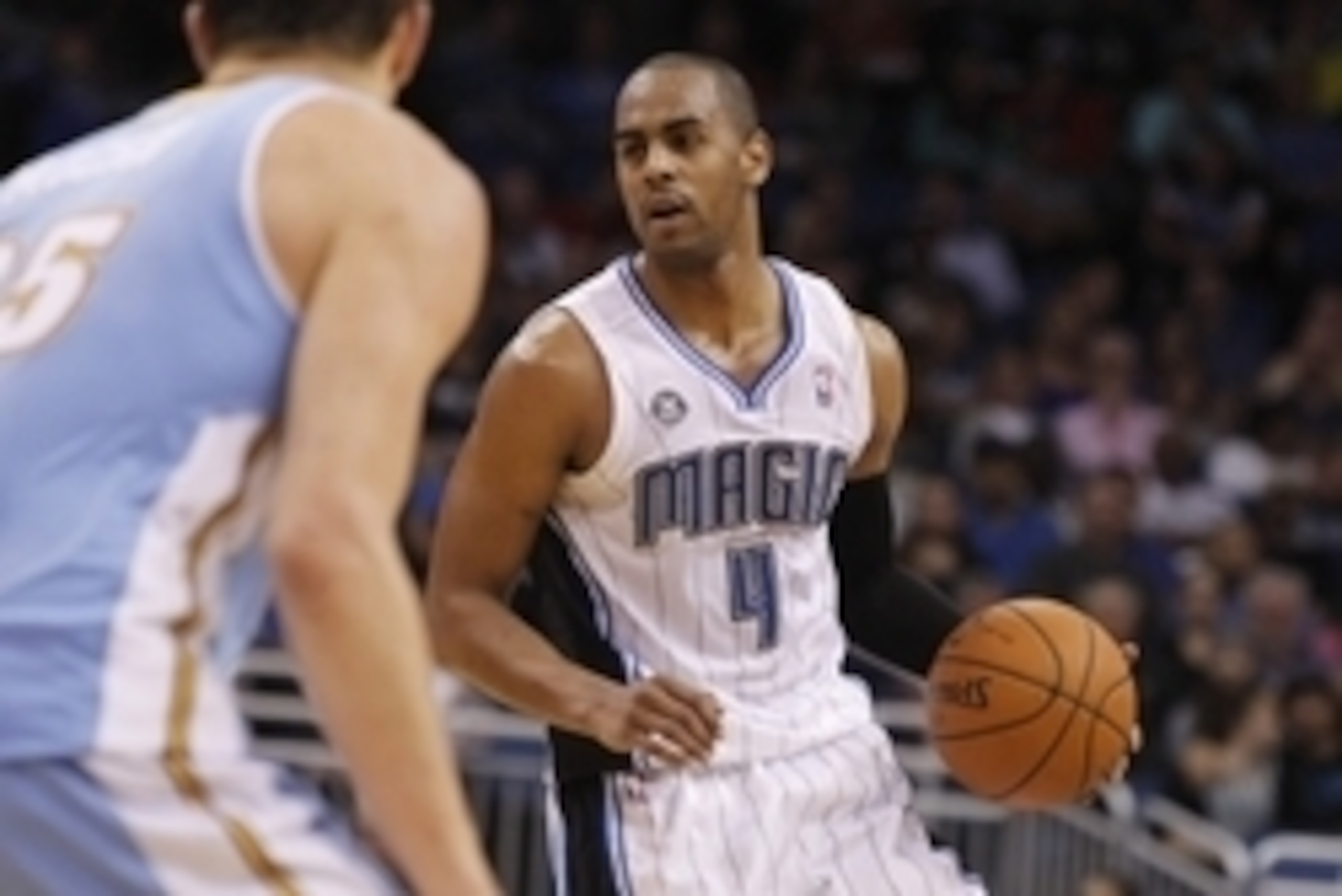 Mar 12, 2014; Orlando, FL, USA; Orlando Magic guard Arron Afflalo (4) drives to the basket against the Denver Nuggets during the second half at Amway Center. Denver Nuggets defeated the Orlando Magic 120-112. Mandatory Credit: Kim Klement-USA TODAY Sports