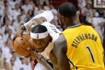 May 30, 2014; Miami, FL, USA; Miami Heat forward LeBron James (left) posts up against Indiana Pacers guard Lance Stephenson (1) during the first half in game six of the Eastern Conference Finals of the 2014 NBA Playoffs at American Airlines Arena. Mandato