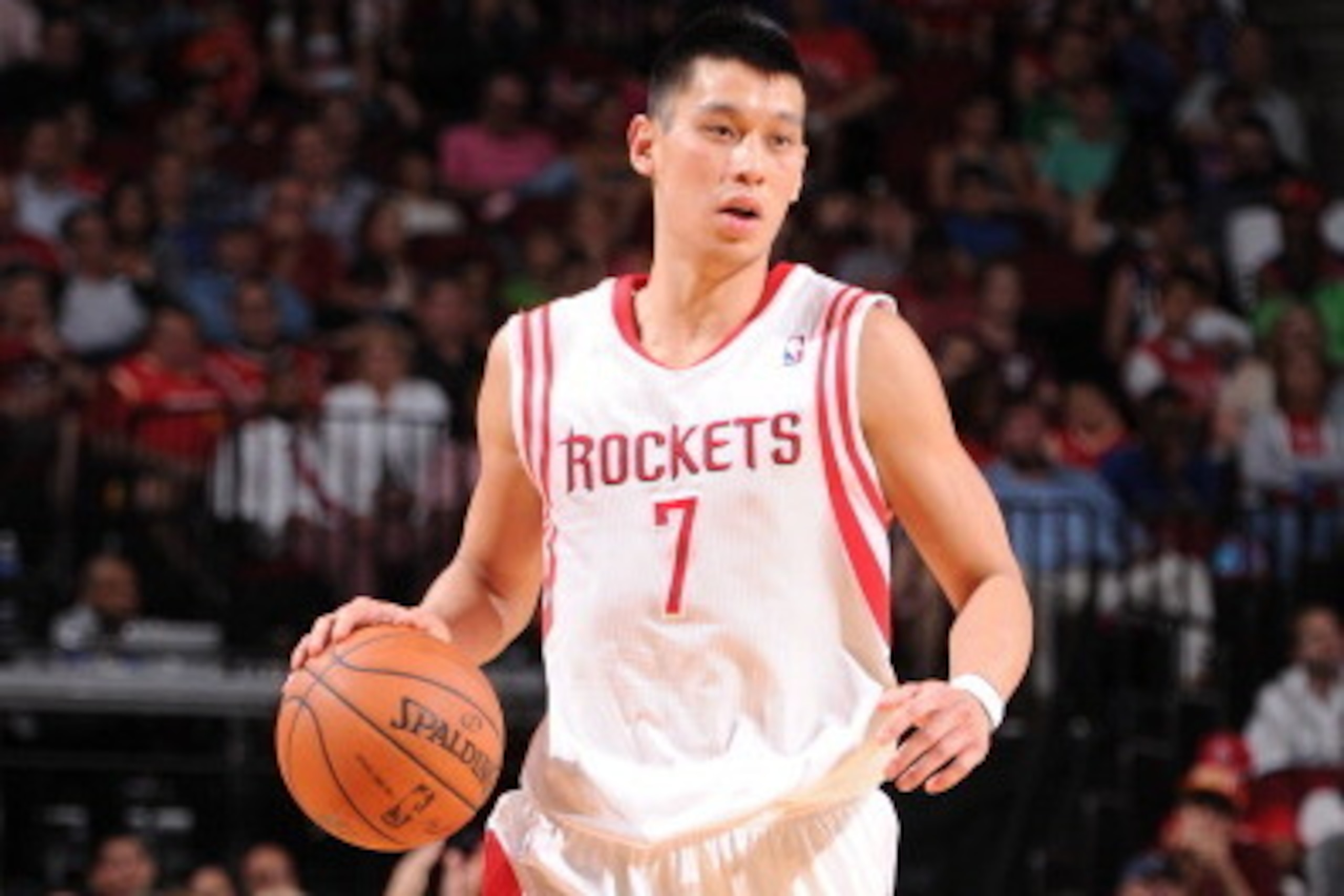 HOUSTON, TX - APRIL 12:  Jeremy Lin #7 of the Houston Rockets handles the ball against the New Orleans Pelicans on April 12, 2014 at the Toyota Center in Houston, Texas. NOTE TO USER: User expressly acknowledges and agrees that, by downloading and or usin